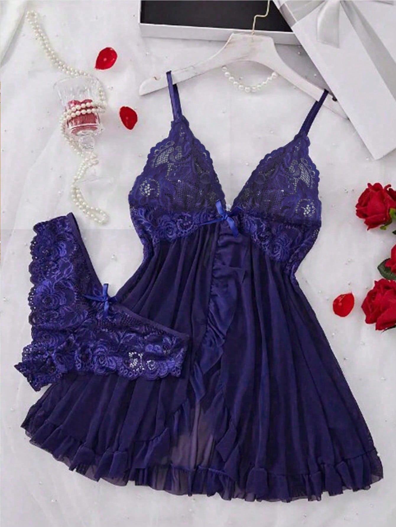 Women's 2-piece sexy lingerie set featuring a deep V sheer contrast lace babydoll bra with adjustable spaghetti straps and matching low-rise briefs; wireless plunge style with short sleeveless romantic design.