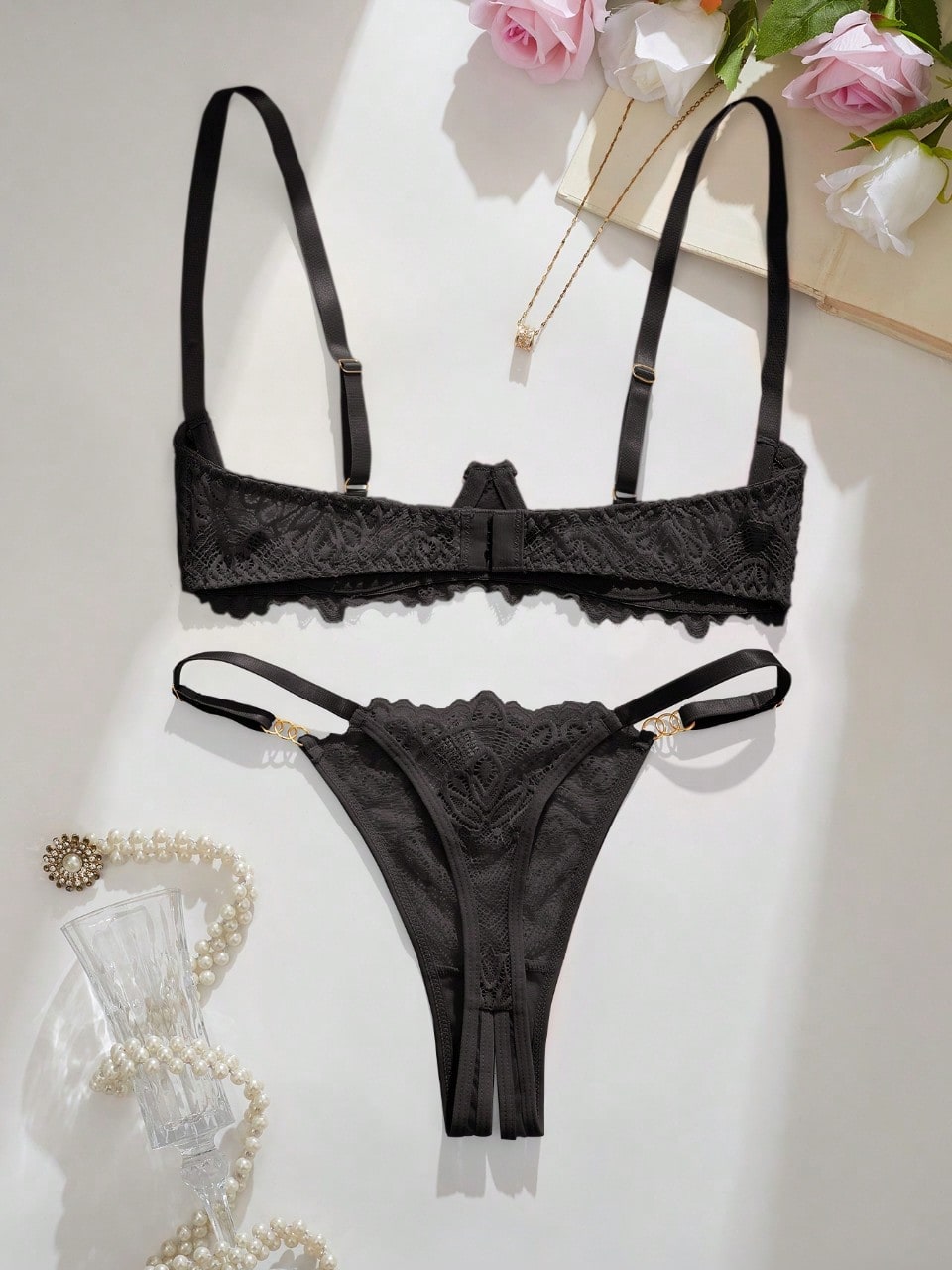 Women’s sexy floral lace lingerie set featuring a bra and thong panty in a 2-piece matching set.