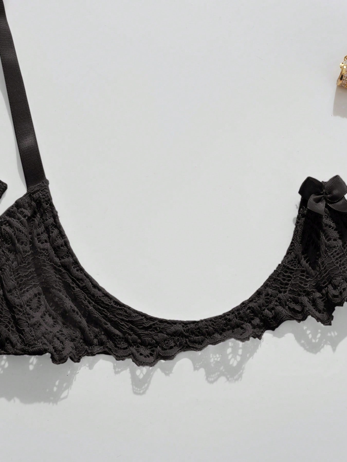 Women’s sexy floral lace lingerie set featuring a bra and thong panty in a 2-piece matching set.