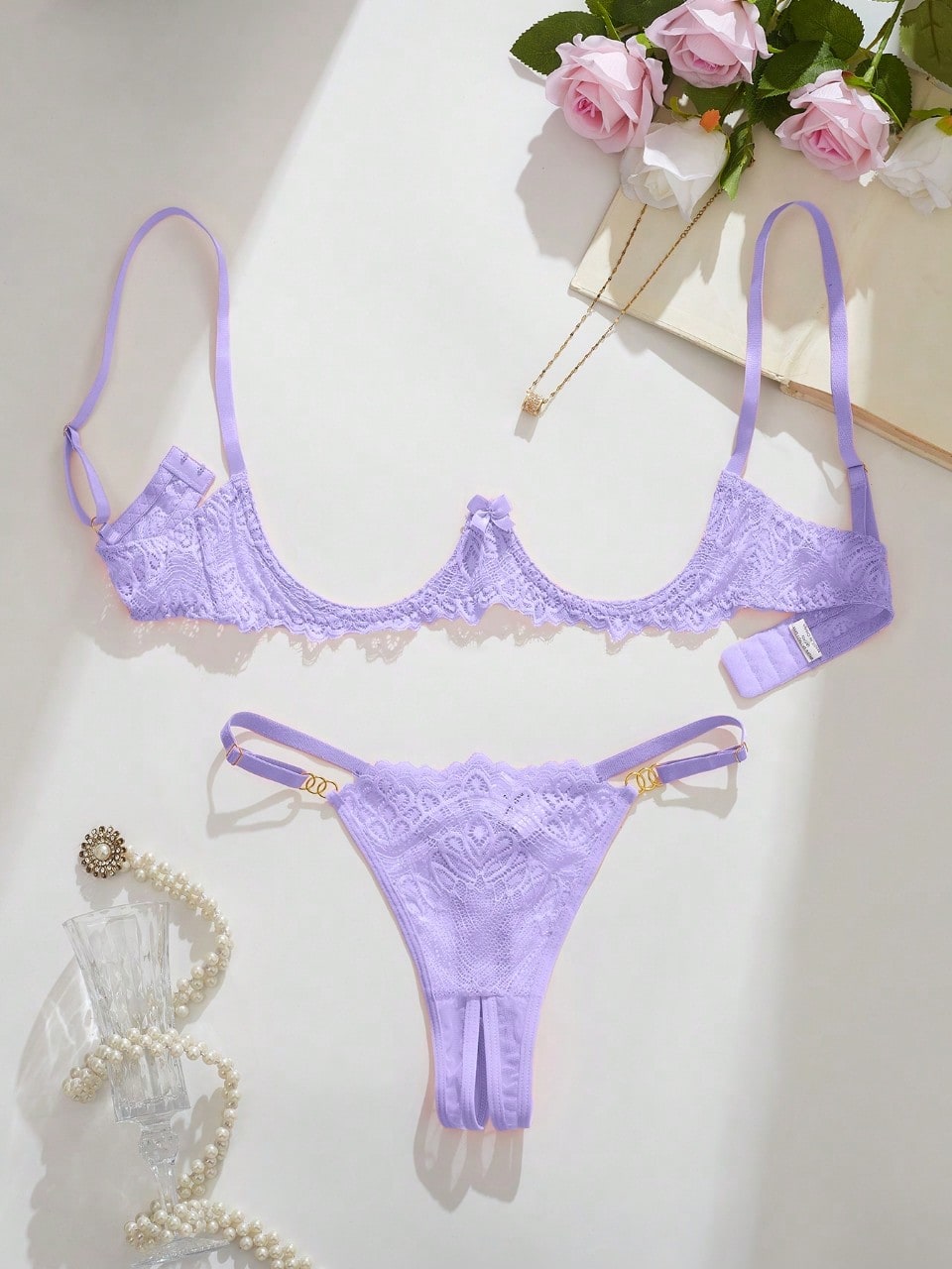 Women’s sexy floral lace lingerie set featuring a bra and thong panty in a 2-piece matching set.