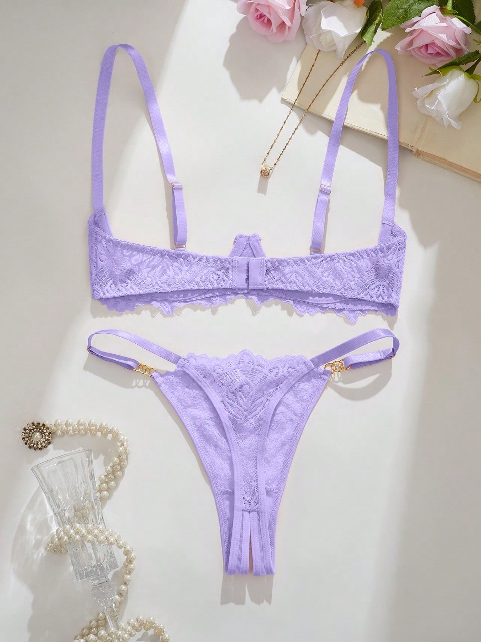 Women’s sexy floral lace lingerie set featuring a bra and thong panty in a 2-piece matching set.