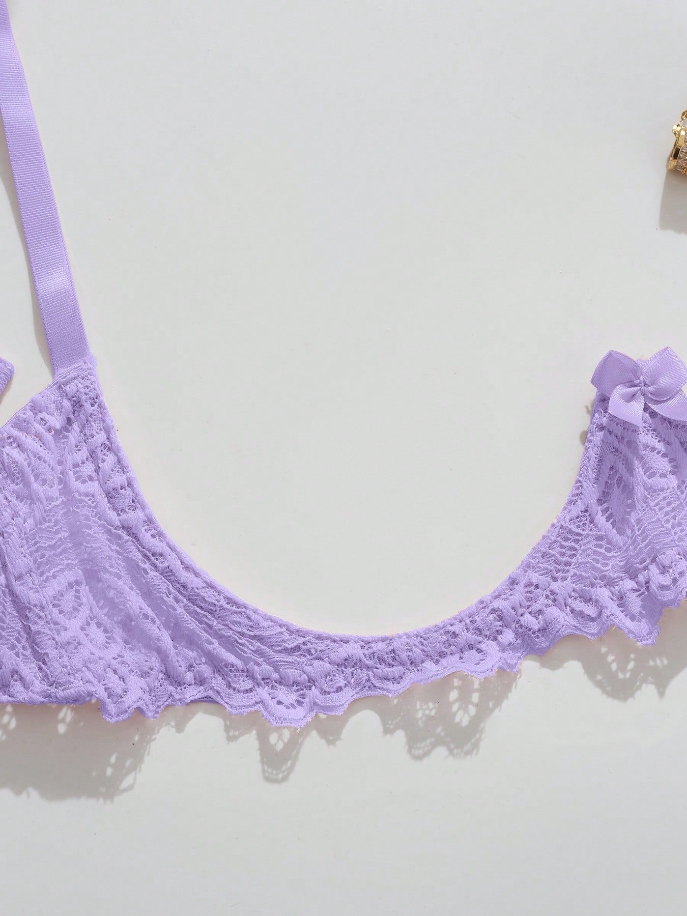 Women’s sexy floral lace lingerie set featuring a bra and thong panty in a 2-piece matching set.