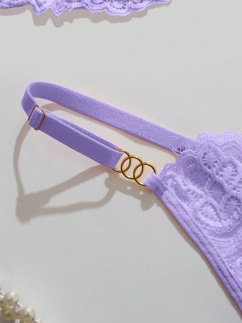 Women’s sexy floral lace lingerie set featuring a bra and thong panty in a 2-piece matching set.