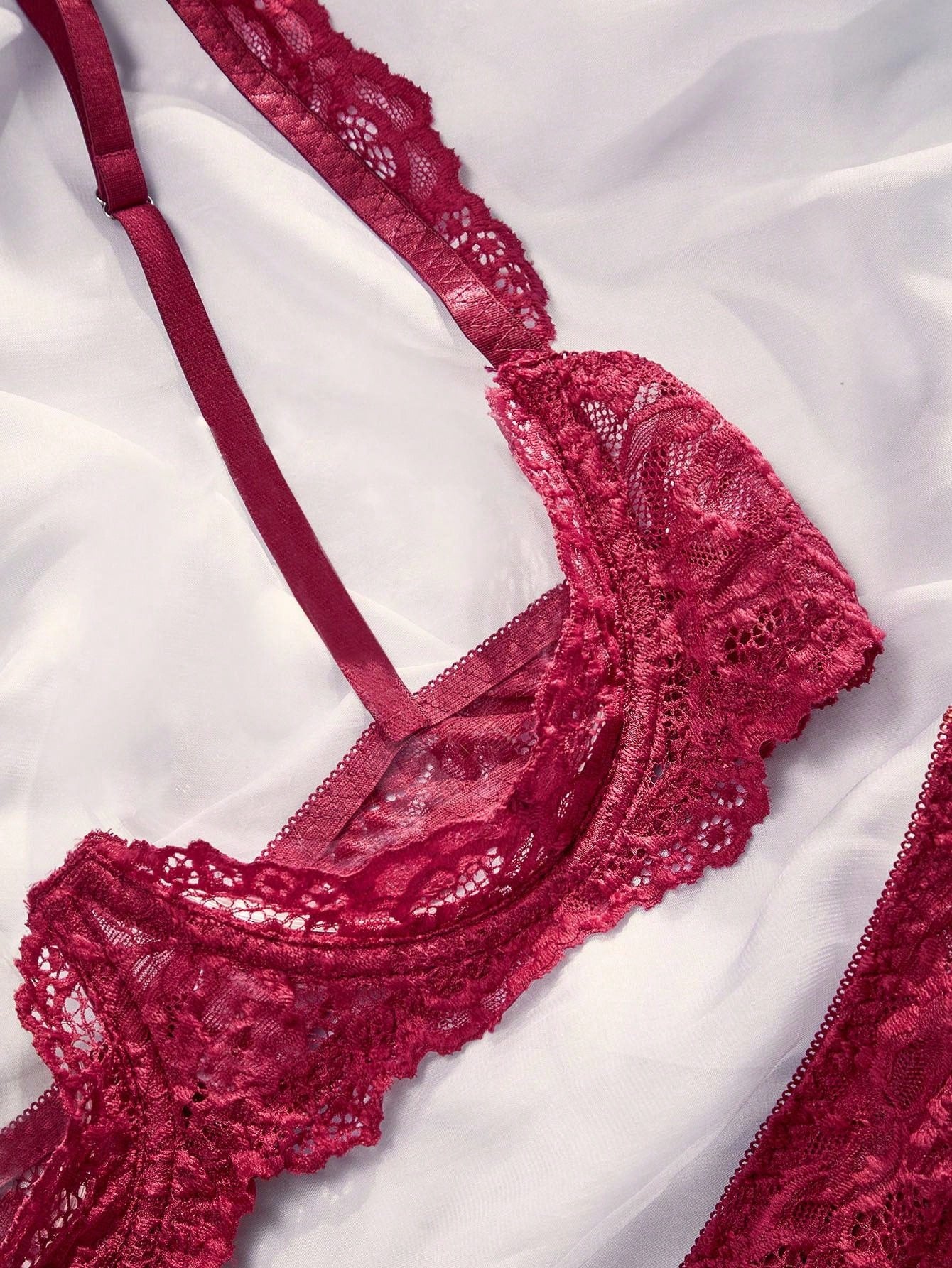 Women’s 2-piece contrast lace lingerie set with a sheer plain design, featuring an underwire open-cup bra with adjustable spaghetti straps and matching low-rise V-string panties.