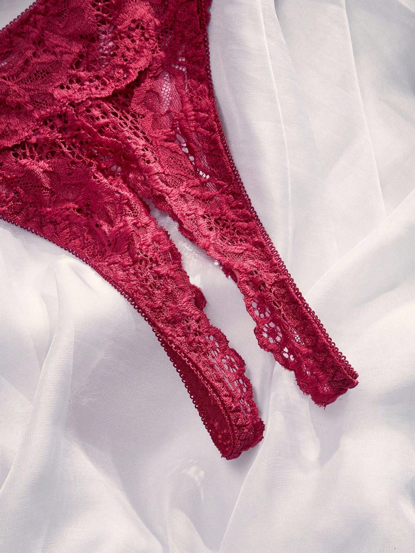 Women’s 2-piece contrast lace lingerie set with a sheer plain design, featuring an underwire open-cup bra with adjustable spaghetti straps and matching low-rise V-string panties.