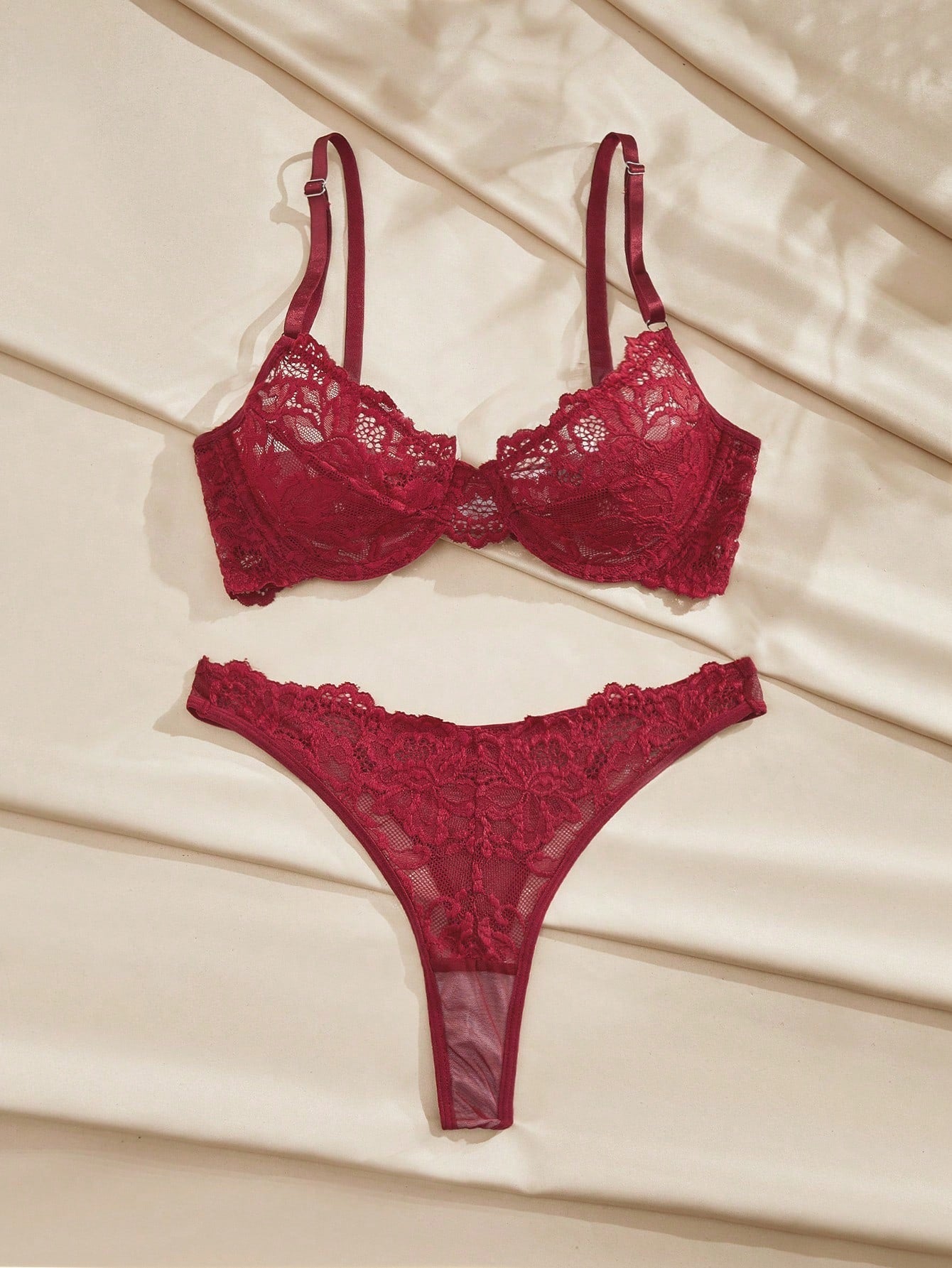 Burgundy floral lace underwire lingerie set with adjustable spaghetti straps, demi bra, and matching mid-rise thong