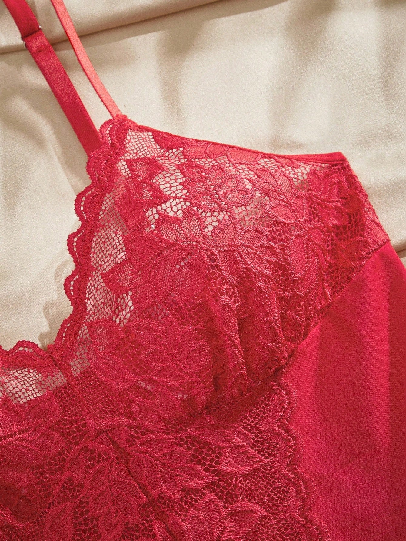 Women’s wireless floral lace sheer backless bodysuit with adjustable spaghetti straps, triangle cups, and brief-cut bottom.