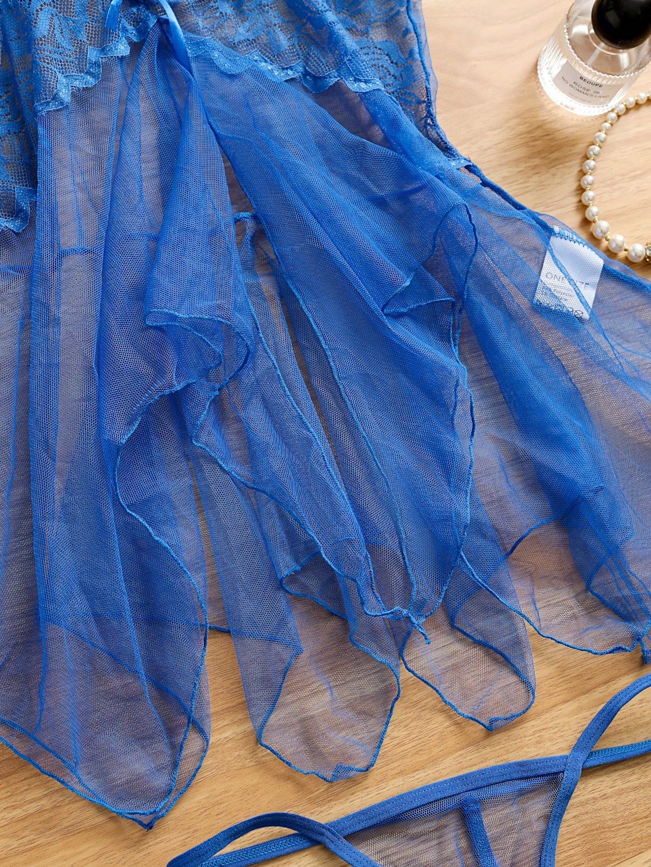 Royal blue 2-piece sexy lingerie set featuring a sheer mesh babydoll nightgown with contrast lace and mesh details, spaghetti straps, wireless triangle bra styling, and a matching low-rise thong.