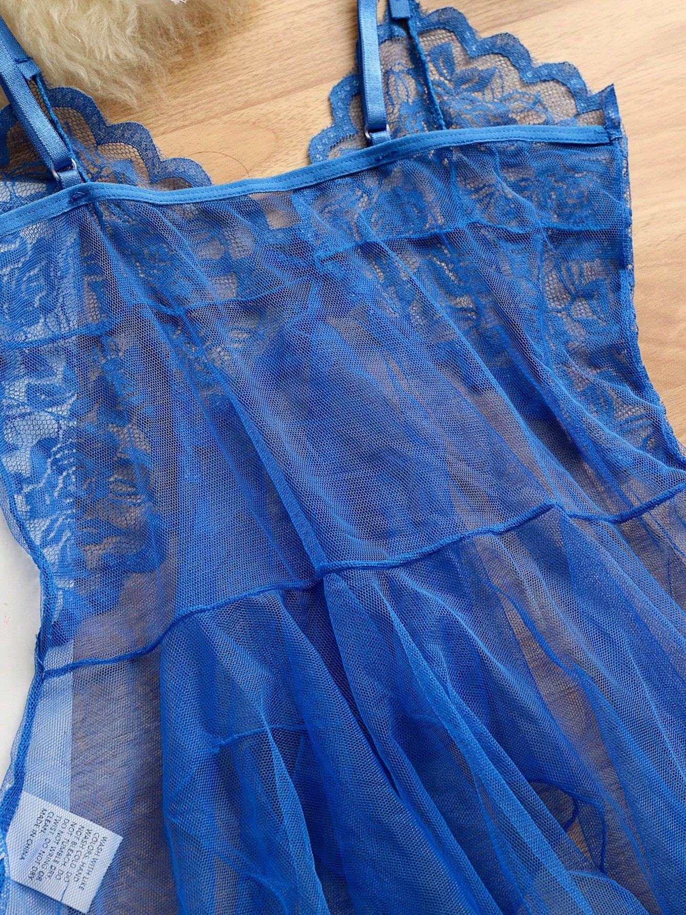 Royal blue 2-piece sexy lingerie set featuring a sheer mesh babydoll nightgown with contrast lace and mesh details, spaghetti straps, wireless triangle bra styling, and a matching low-rise thong.