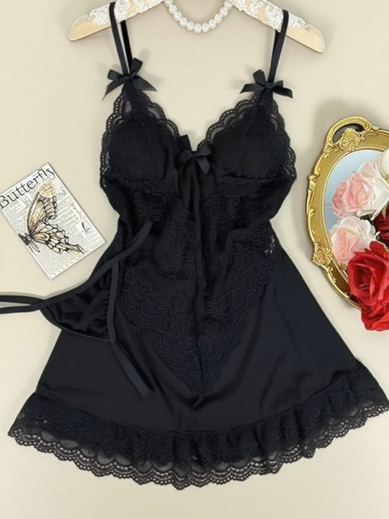 2-piece women’s lingerie set featuring a lace camisole-style mini nightdress with spaghetti straps and a matching thong, designed for loungewear, romantic occasions, and rave styling.