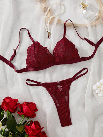 Women’s 2-piece lace patchwork solid-color lingerie set with a spaghetti-strap crossback bralette and low-rise thong panty, styled for romantic or festival looks.