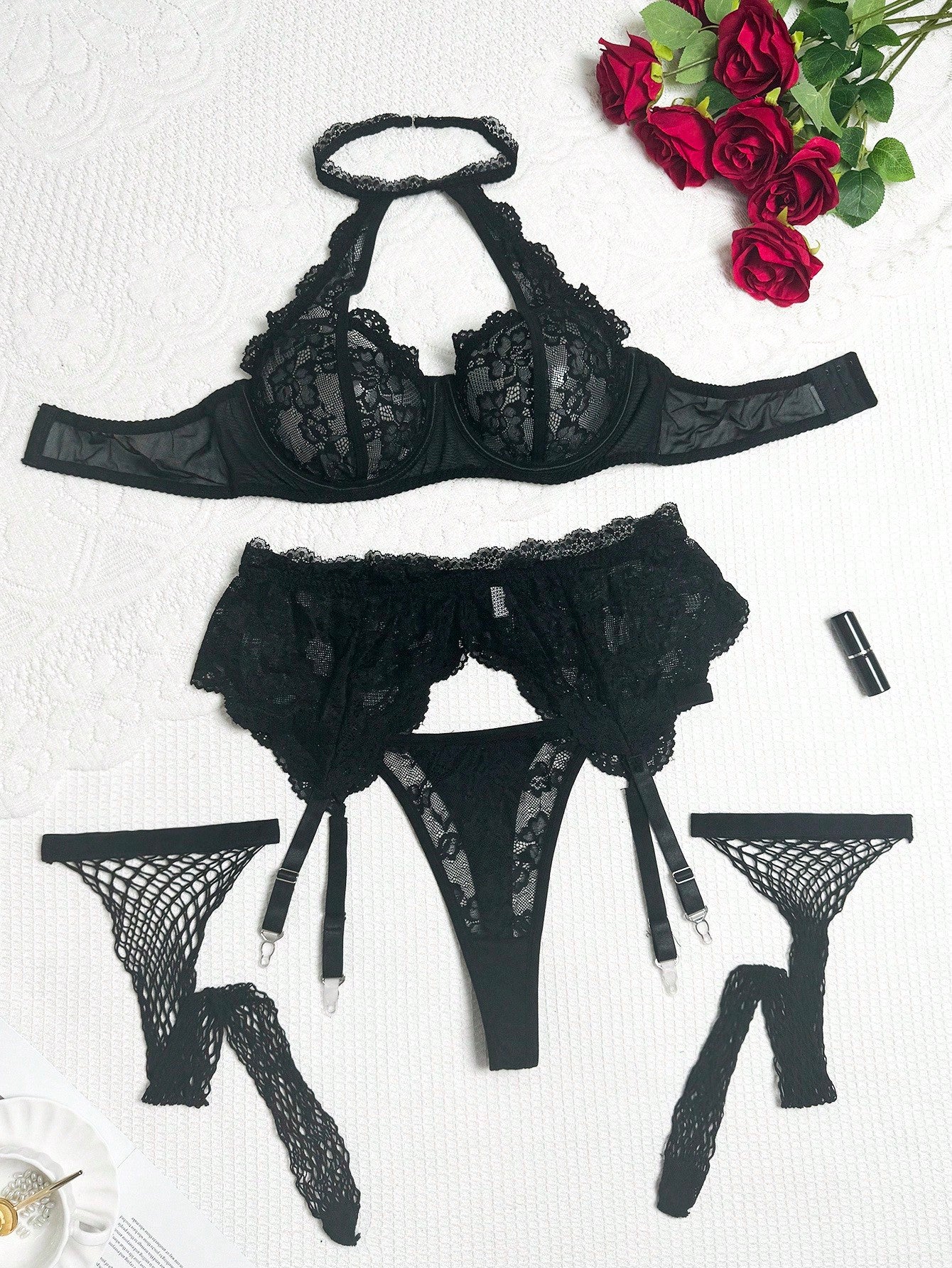 Plus size 5-piece lace lingerie set featuring a halter underwire top with adjustable straps, garter belt, thong-style G-string, and one pair of thigh-high fishnet stockings.