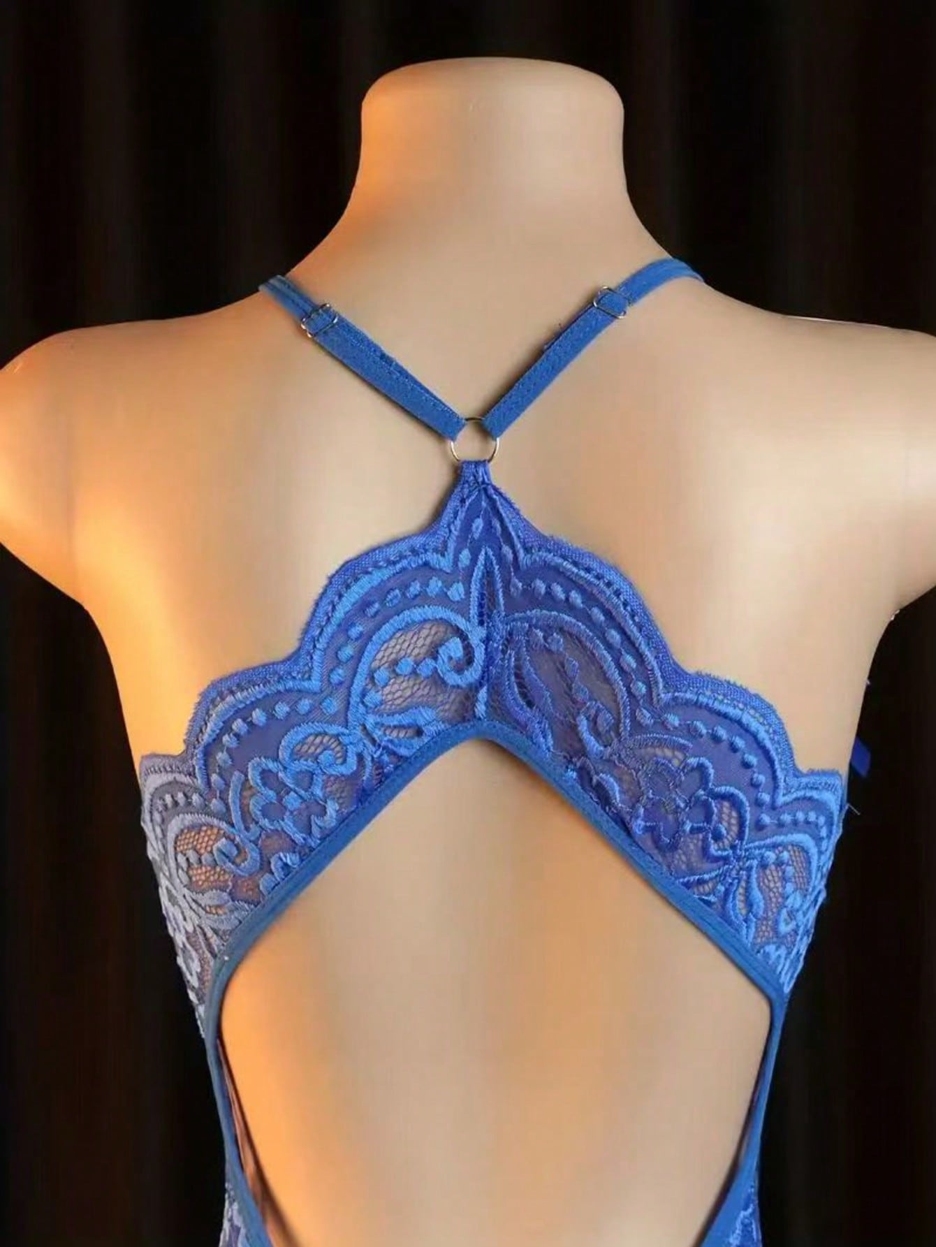 Women's sexy bodysuit with crotchless, hollow-out design, featuring contrast lace and mesh, spaghetti straps, crossback detail, plunge wireless shape, and semi-sheer fabric.