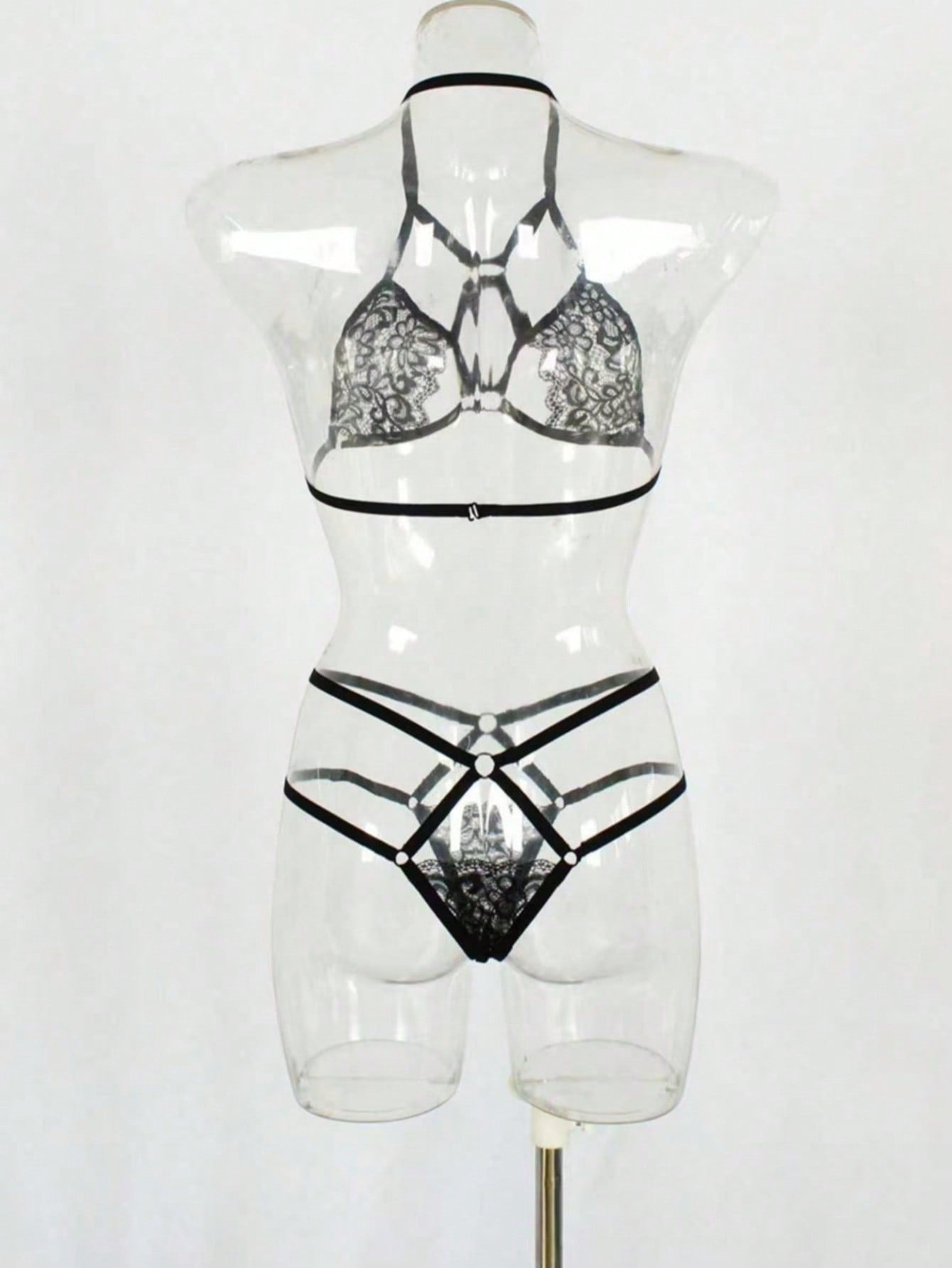 Red lace and mesh women's lingerie set with adjustable strap bralette and low-rise thong, semi-sheer plant pattern design