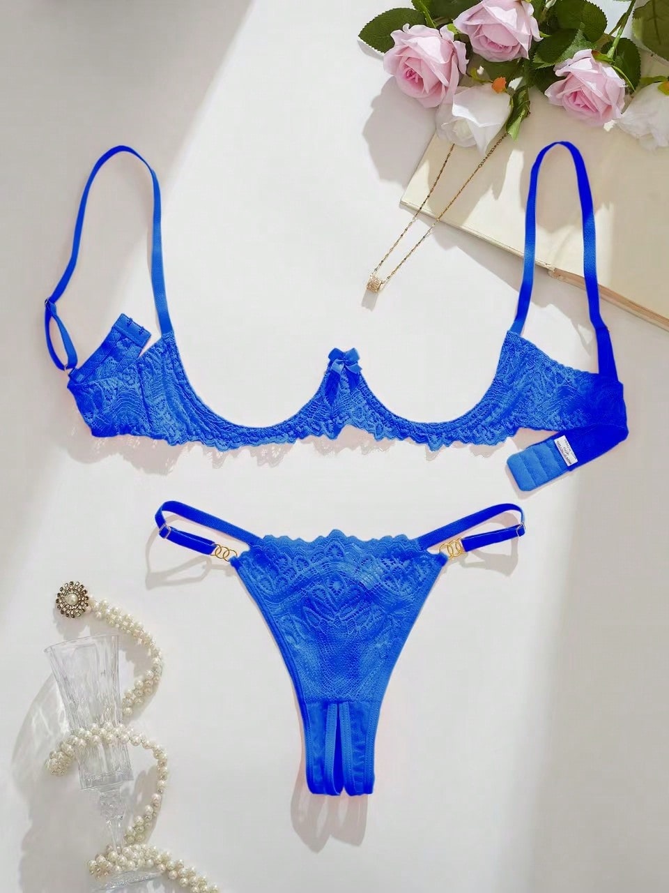 Women’s sexy floral lace lingerie set featuring a bra and thong panty in a 2-piece matching set.