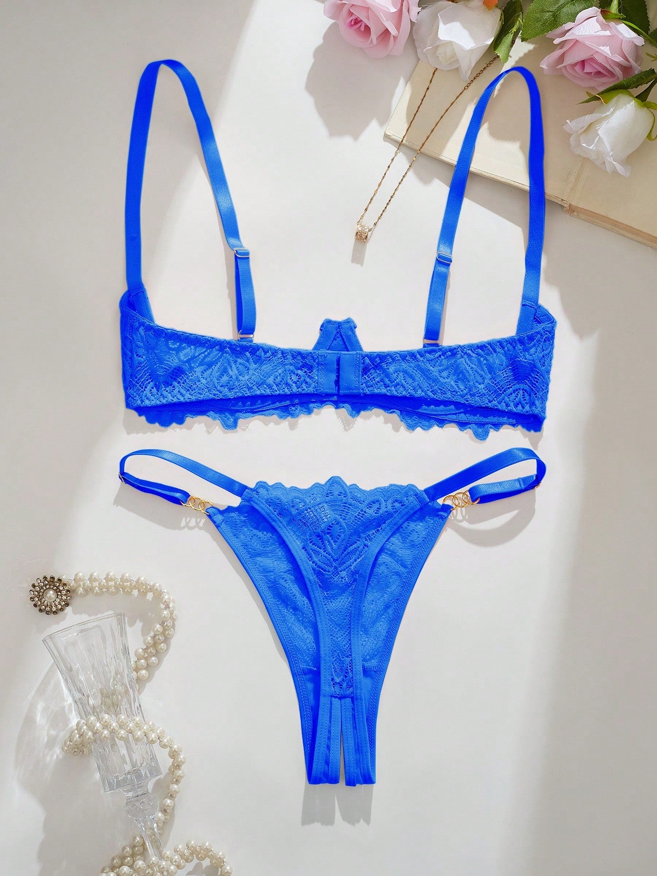 Women’s sexy floral lace lingerie set featuring a bra and thong panty in a 2-piece matching set.