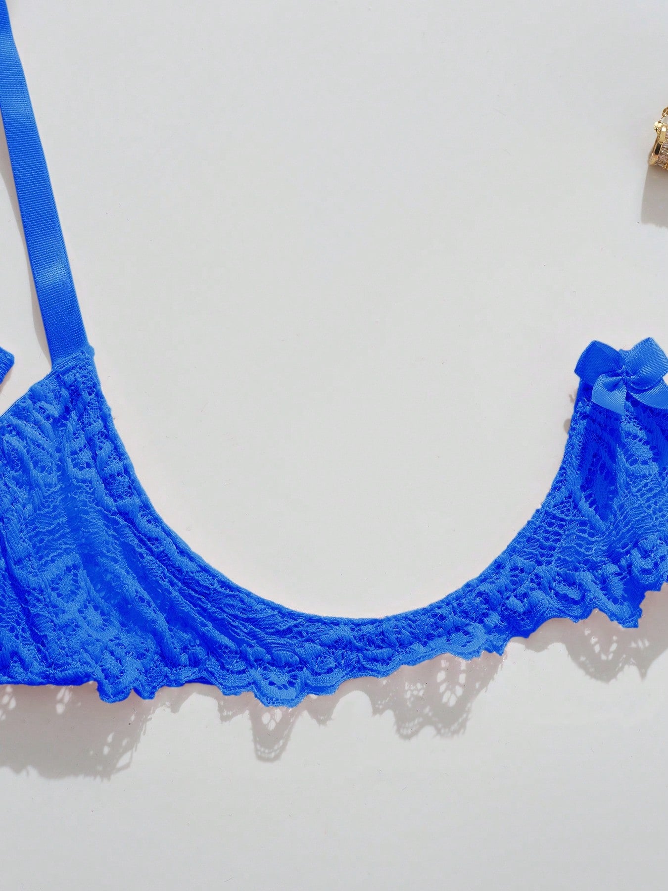 Women’s sexy floral lace lingerie set featuring a bra and thong panty in a 2-piece matching set.