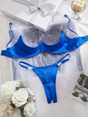 Two-piece women’s sexy lingerie set featuring an underwire lace top with adjustable shoulder straps and a matching low-rise thong, accented with a necklace detail.