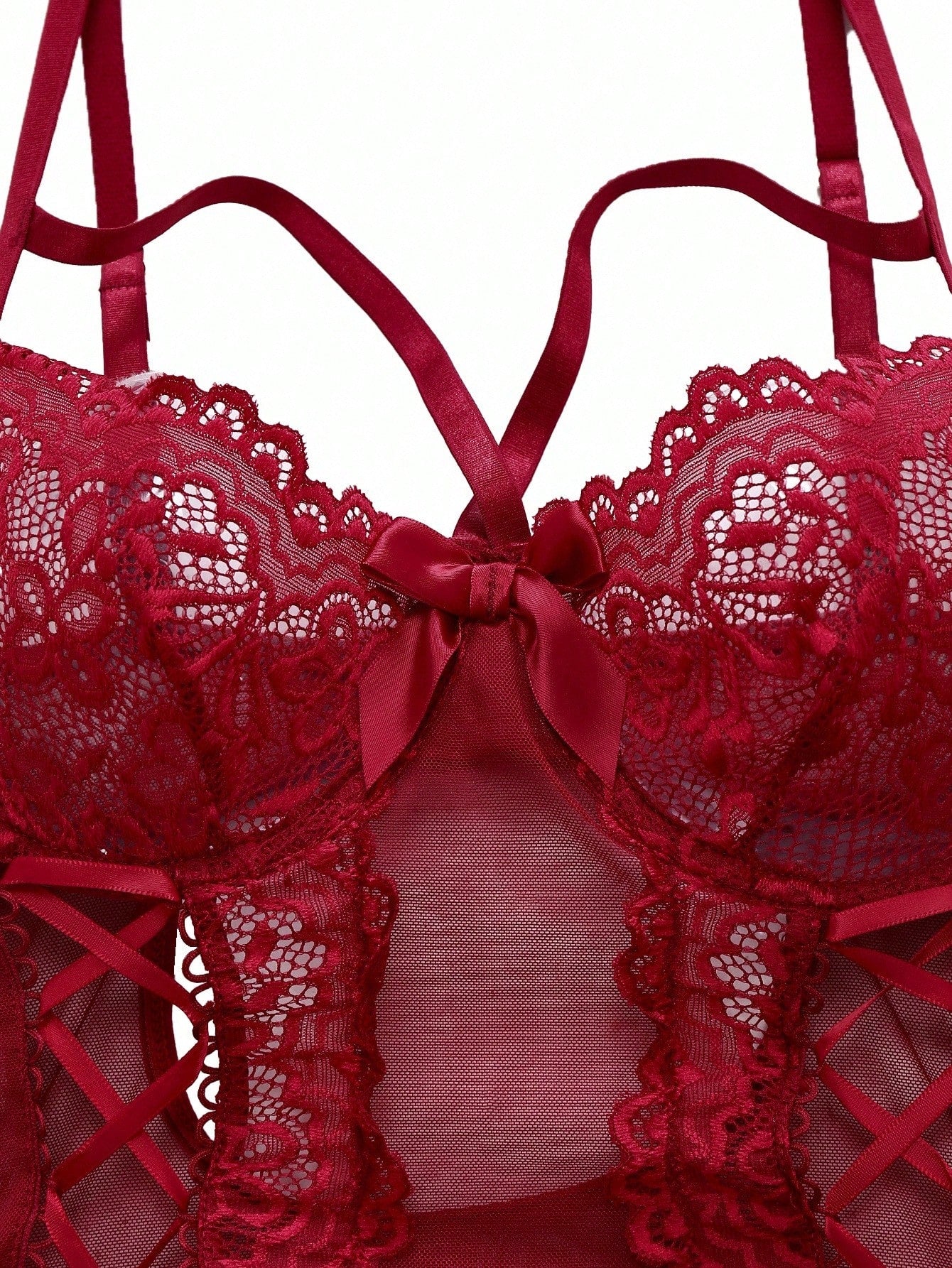 Women’s 4-piece lingerie set featuring lace and mesh panel design with tie-front detail, underwire camisole-style bra with adjustable spaghetti straps, and matching low-rise V-string panties.