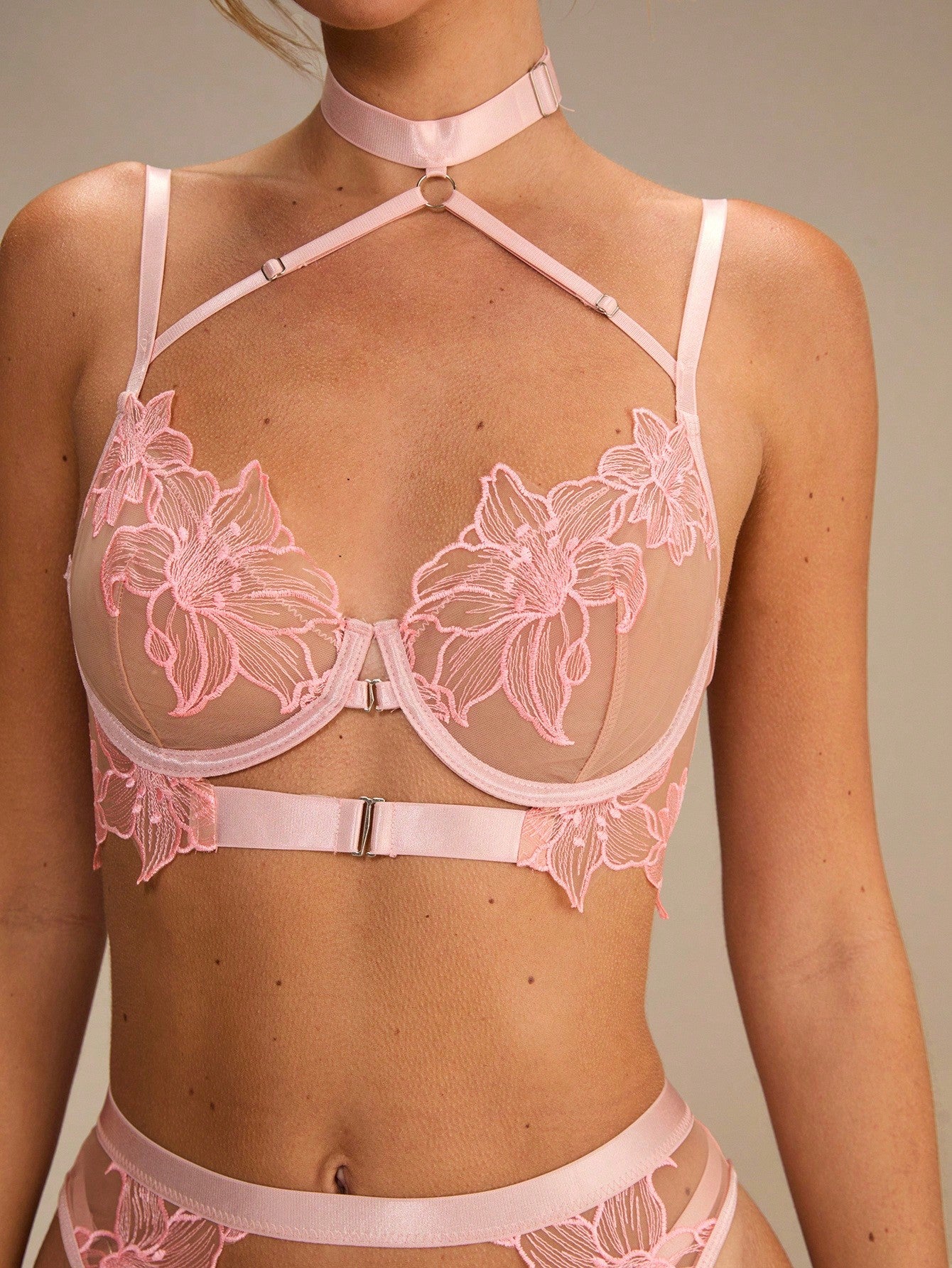 Five-piece women’s romantic lingerie set with embroidered floral details, front-open hook bra, underwire 3/4 cups, adjustable spaghetti straps, cut-out accents, and matching mid-rise thong pieces in sheer slight-stretch fabric.