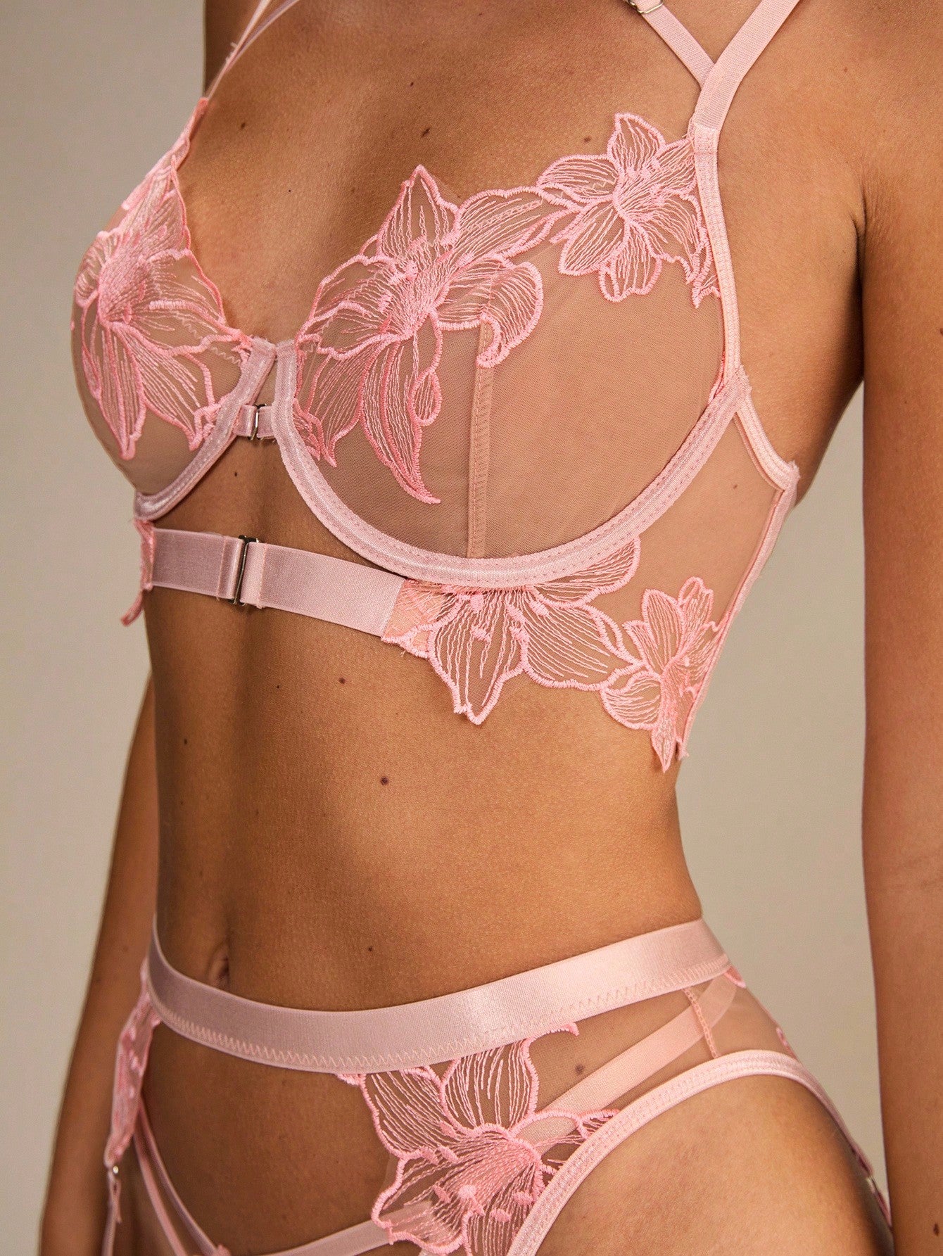 Five-piece women’s romantic lingerie set with embroidered floral details, front-open hook bra, underwire 3/4 cups, adjustable spaghetti straps, cut-out accents, and matching mid-rise thong pieces in sheer slight-stretch fabric.