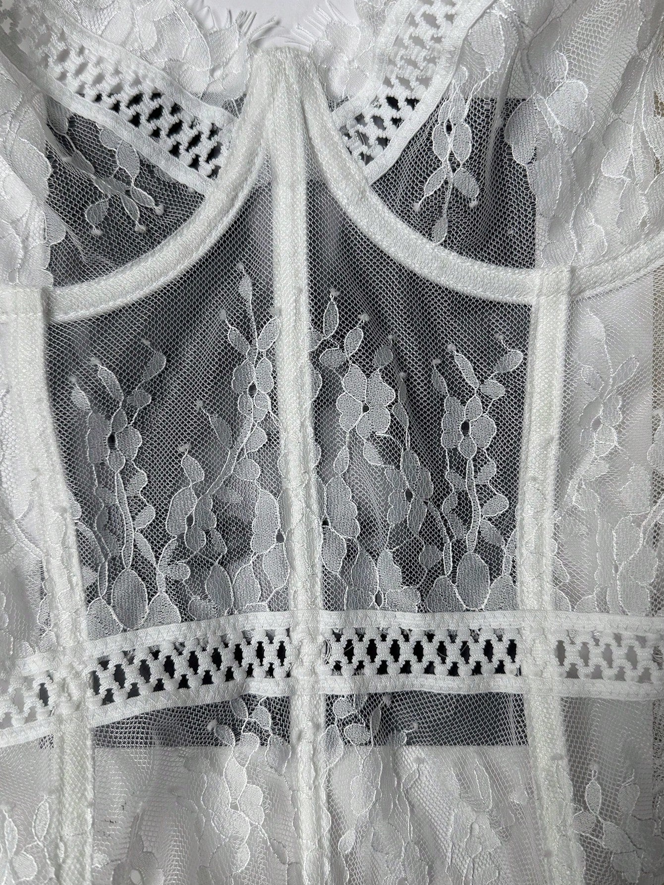 Women’s 3-piece sexy lingerie set featuring a lace longline underwire bustier with adjustable spaghetti straps, matching thong panty, and garter belt with contrast mesh and plant pattern details.