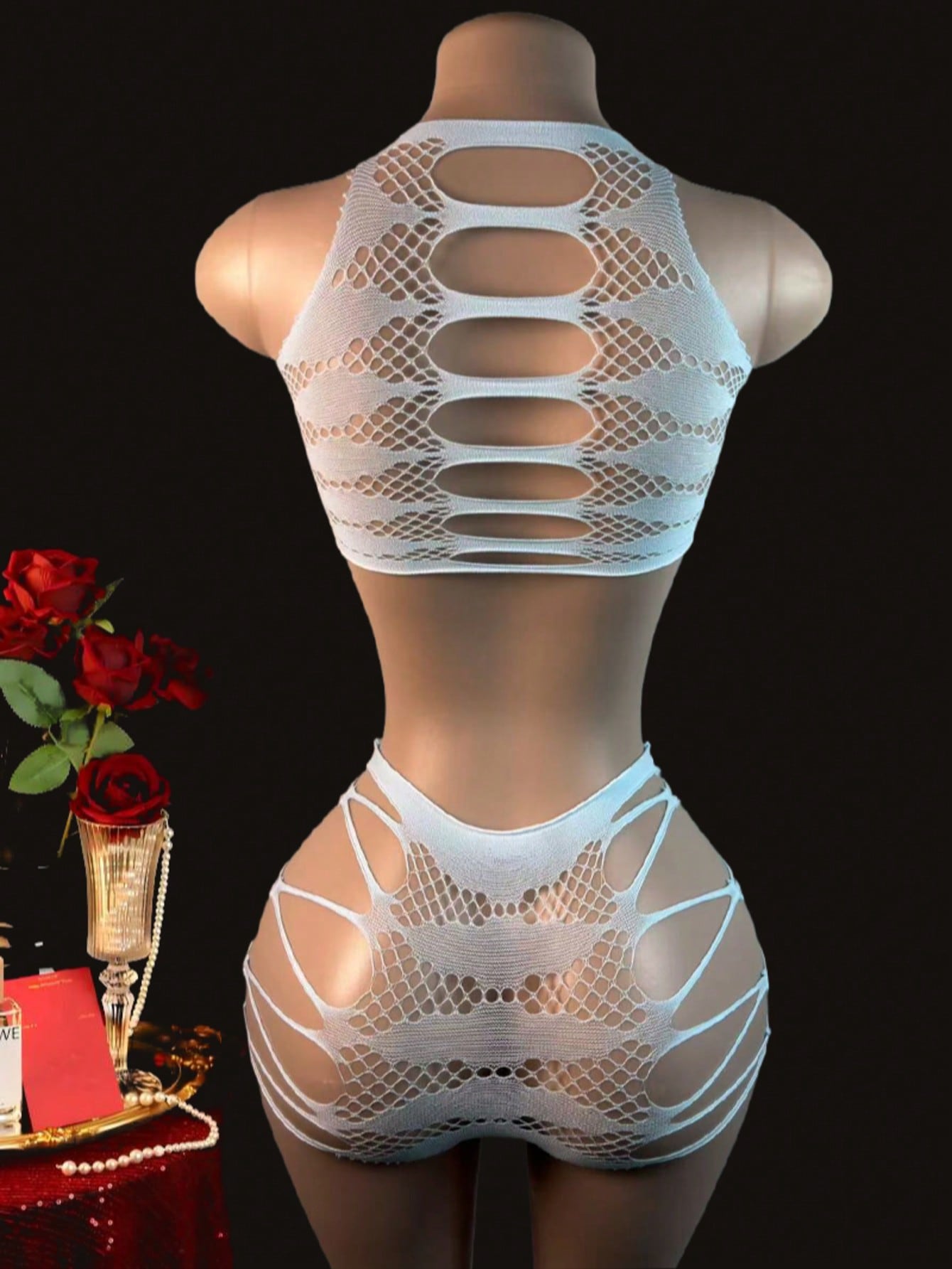Two-piece women’s sexy lingerie set featuring a lace jumpsuit-style design with a sleeveless crop top, wireless full-cup fit, and semi-sheer high-stretch knitted fabric.