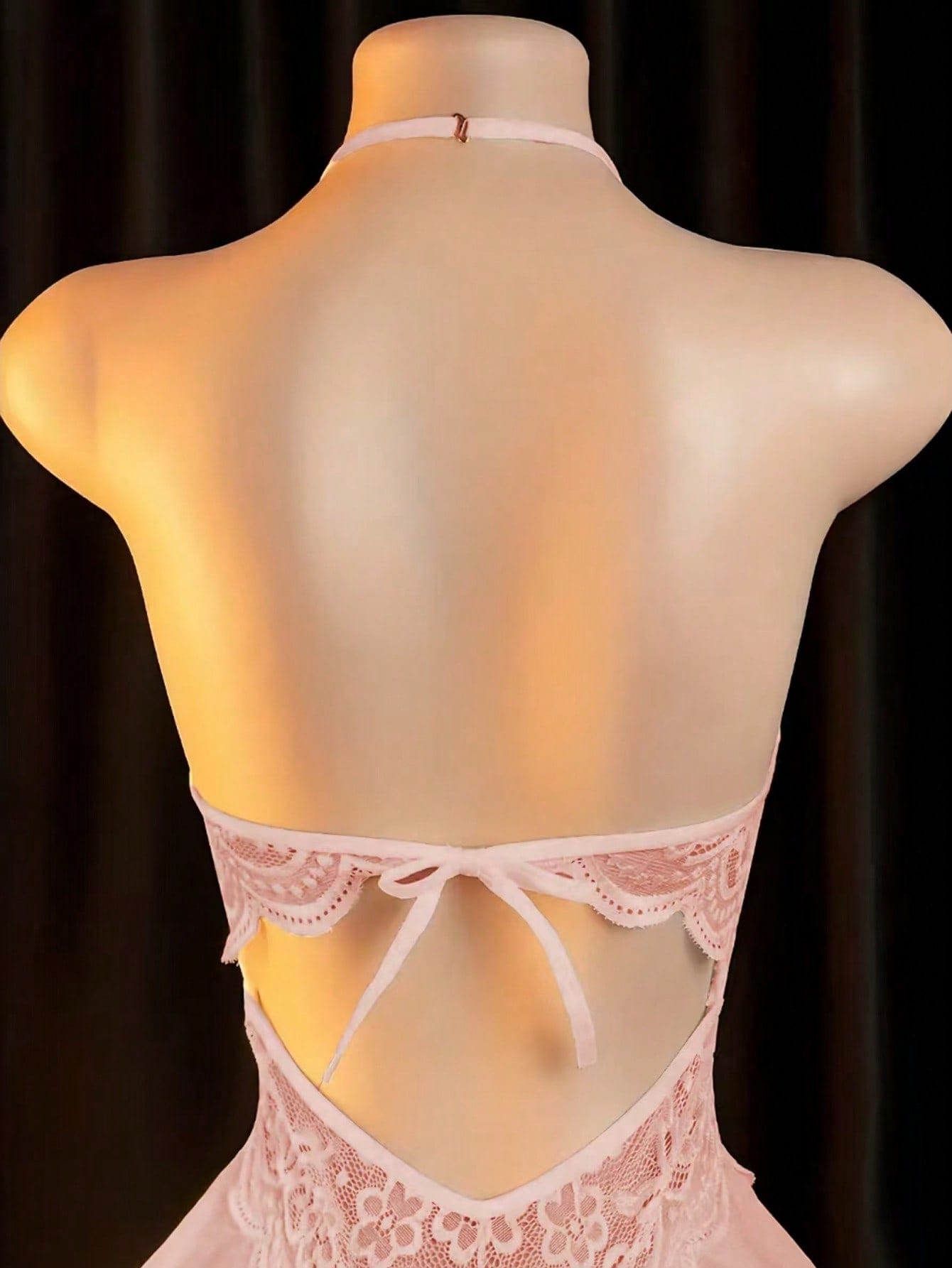 Women’s sexy lingerie set featuring an off-shoulder design with hollow-out detailing, contrast lace, and bow accent in a plain pattern.