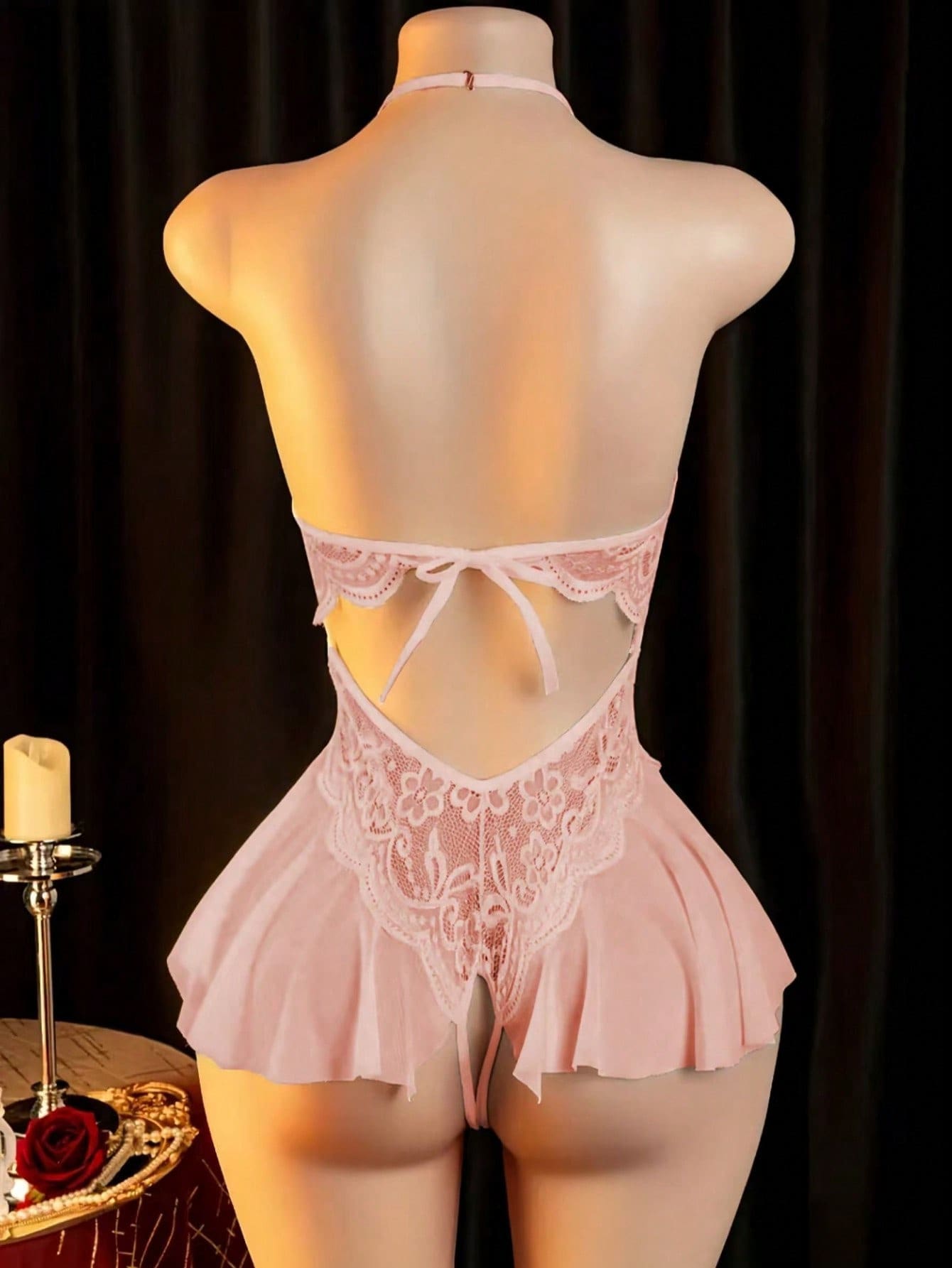 Women’s sexy lingerie set featuring an off-shoulder design with hollow-out detailing, contrast lace, and bow accent in a plain pattern.