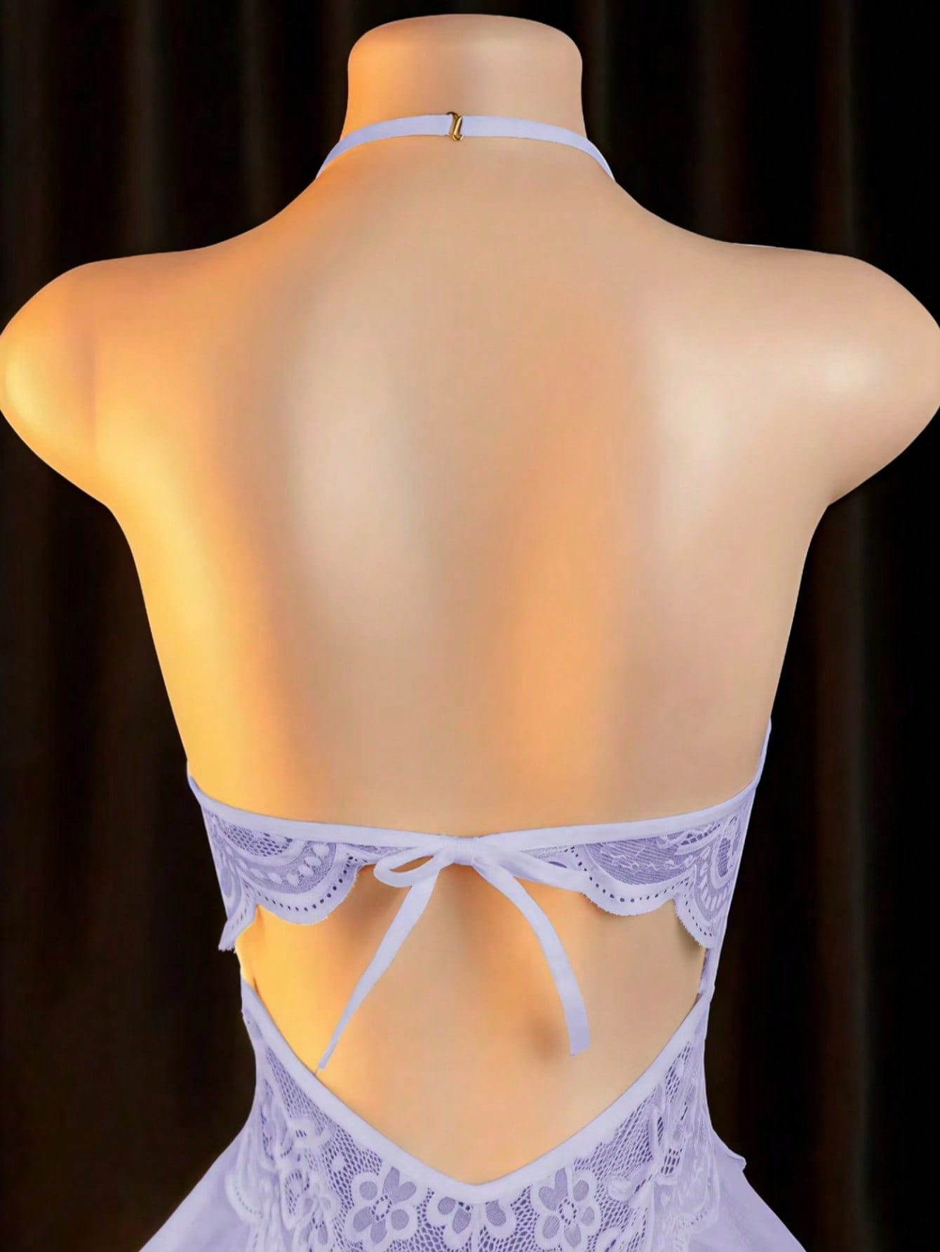 Women’s sexy lingerie set featuring an off-shoulder design with hollow-out detailing, contrast lace, and bow accent in a plain pattern.