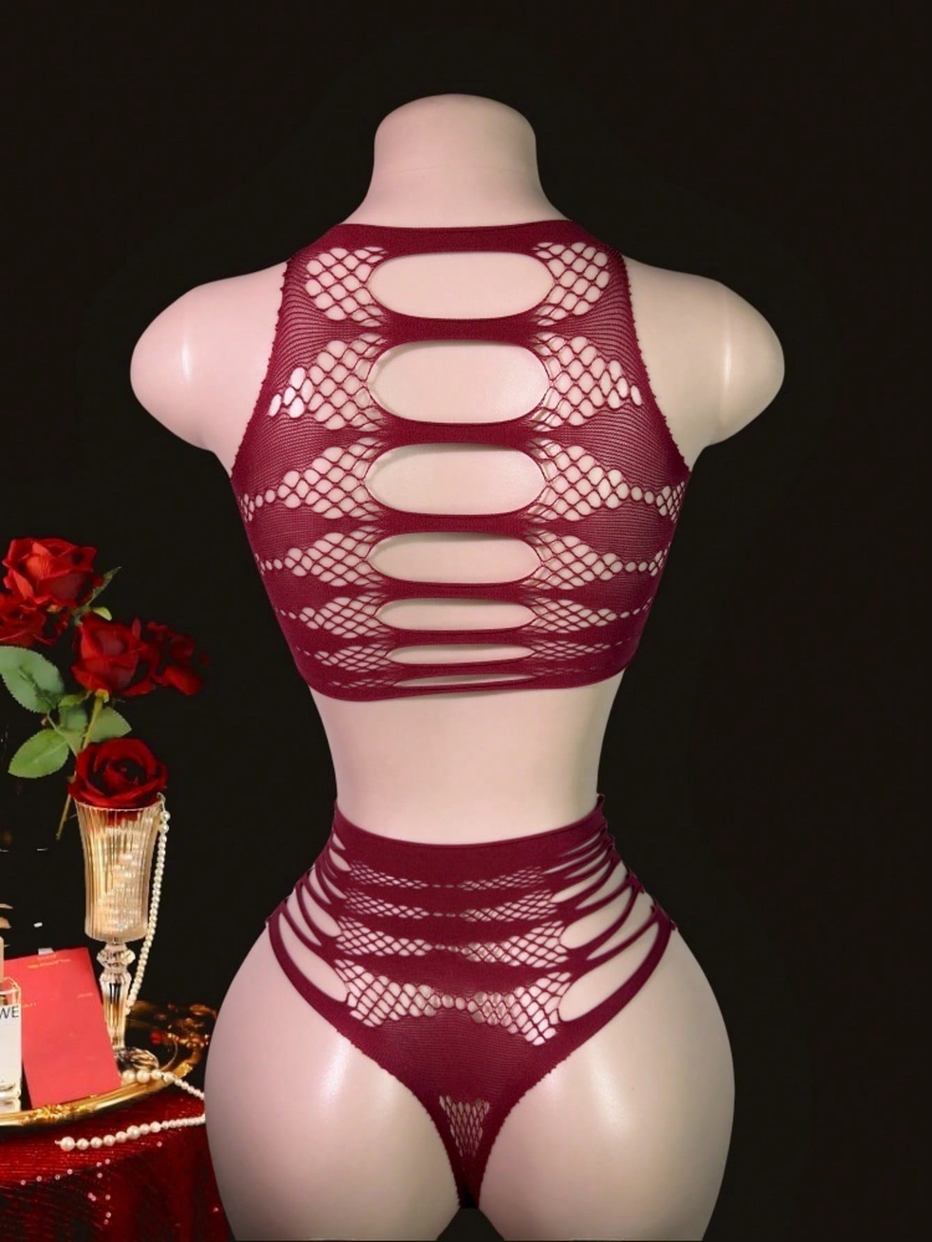 Two-piece women’s sexy lingerie set featuring a lace jumpsuit-style design with a sleeveless crop top, wireless full-cup fit, and semi-sheer high-stretch knitted fabric.