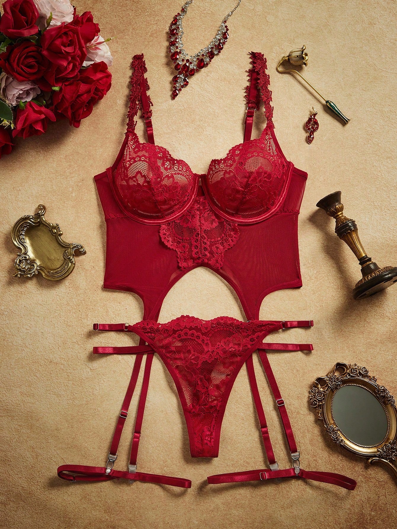 Burgundy 4-piece women’s lingerie set with contrast lace and sheer mesh, featuring a padded underwire camisole bra with adjustable spaghetti straps, cut-out details, and matching low-rise thong pieces.