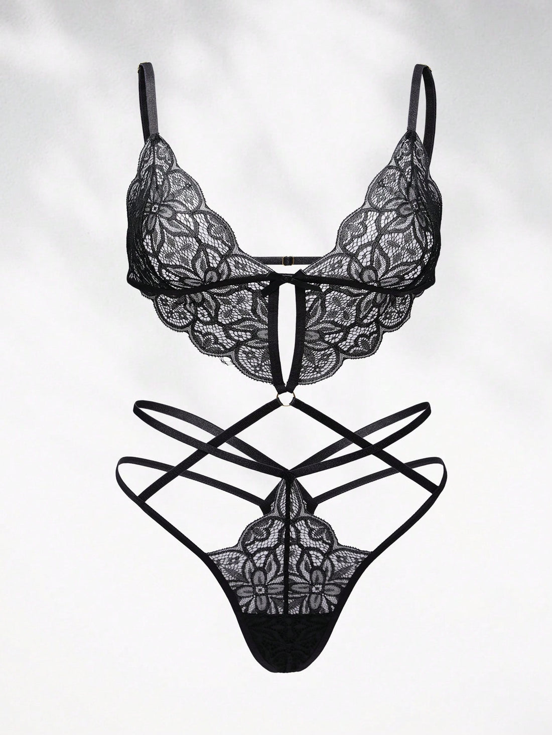 Women’s classic sexy lace bodysuit with cut-out detail, V-neckline, adjustable spaghetti straps, wireless bralette, thong-style bottom, and semi-sheer fabric.