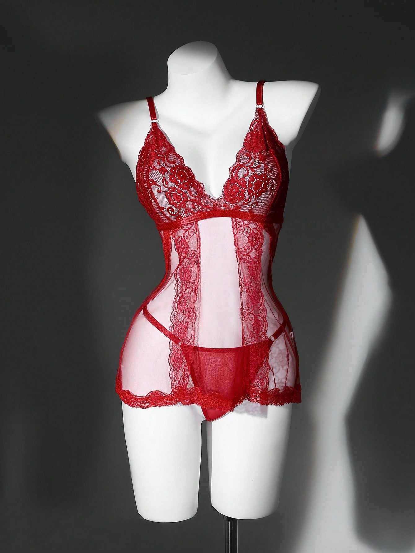 Women's 2-piece lace mesh lingerie set featuring a sheer, backless short nightgown with adjustable spaghetti straps and a matching low-rise thong (G-string); wireless triangle style, available in Black, Burgundy, and Multicolor.