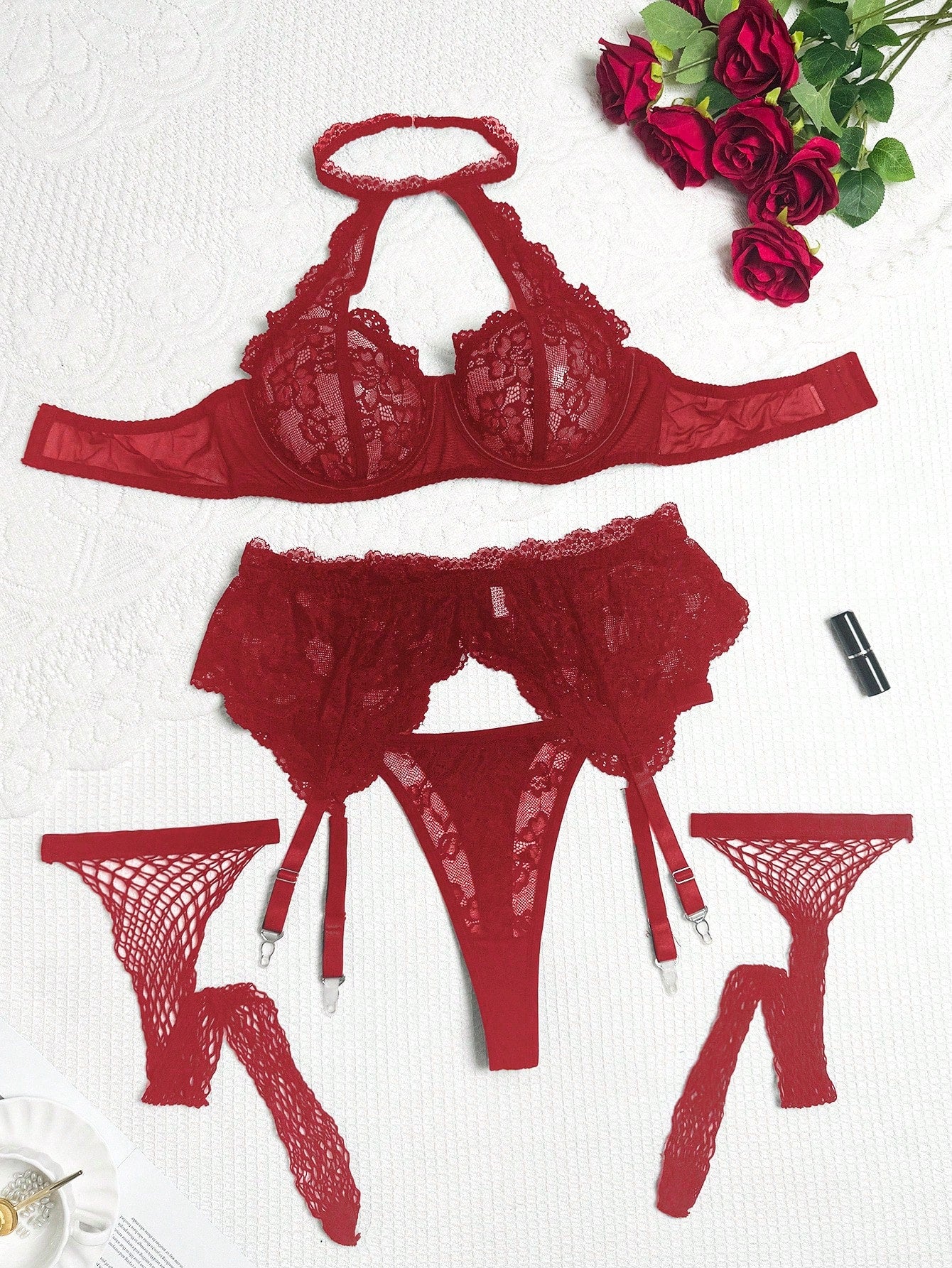Plus size 5-piece lace lingerie set featuring a halter underwire top with adjustable straps, garter belt, thong-style G-string, and one pair of thigh-high fishnet stockings.