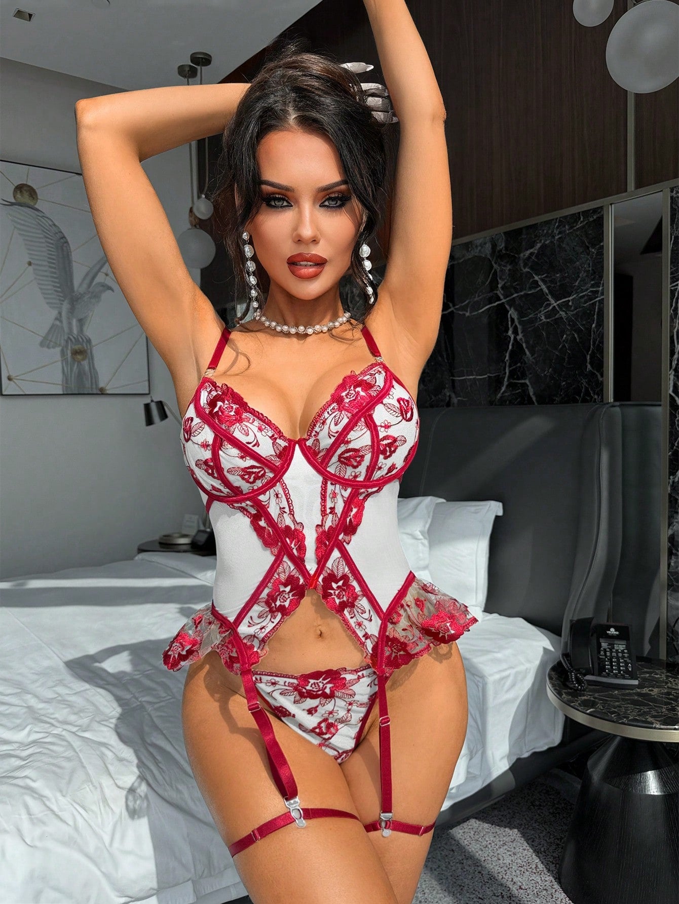 Women’s 4-piece lingerie set featuring an embroidered mesh splicing garter bustier, matching G-string thong, and two leg rings, with adjustable spaghetti straps, underwire cup detail, bow accent, and sheer design.