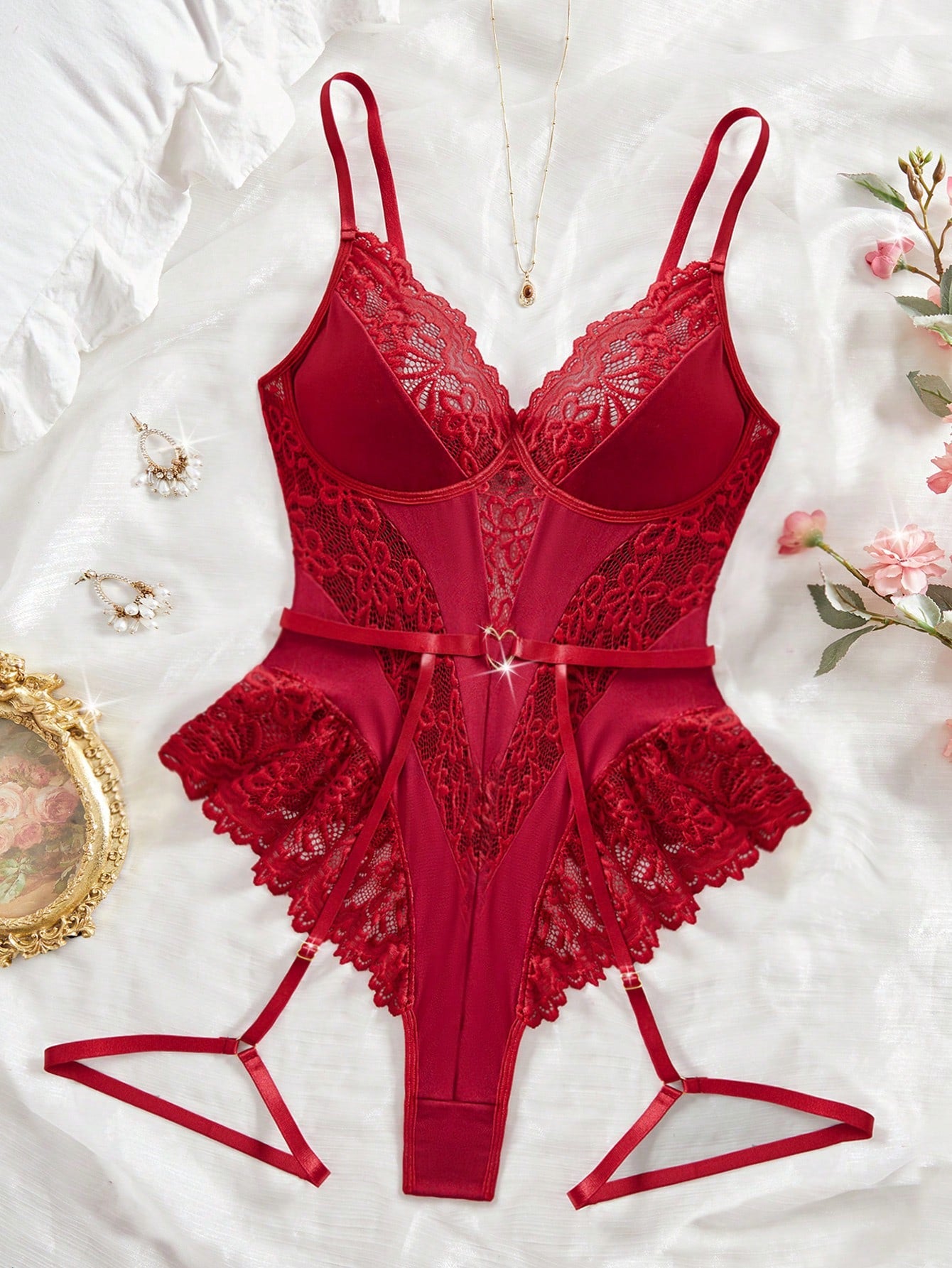 Women’s 2-piece sexy lace patch bodysuit set featuring adjustable spaghetti straps, cut-out details, semi-sheer fabric, and thong-style bottoms.