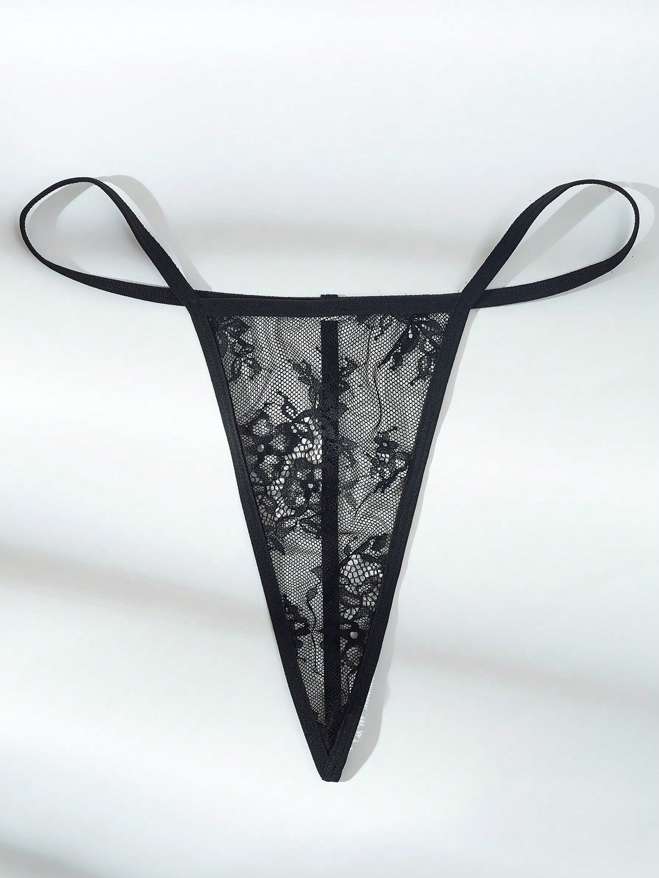 Women’s 5-piece romantic lace lingerie set featuring a sheer bralette with adjustable spaghetti straps, mini skirt, thong, and stockings with contrast lace and bow details.