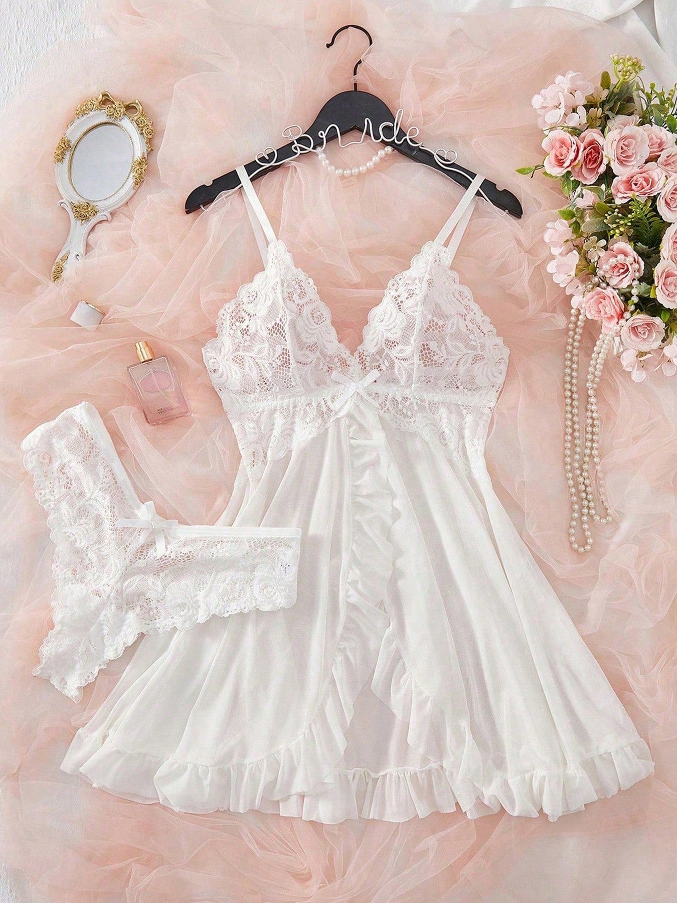 Women's 2-piece sexy lingerie set featuring a deep V sheer contrast lace babydoll bra with adjustable spaghetti straps and matching low-rise briefs; wireless plunge style with short sleeveless romantic design.