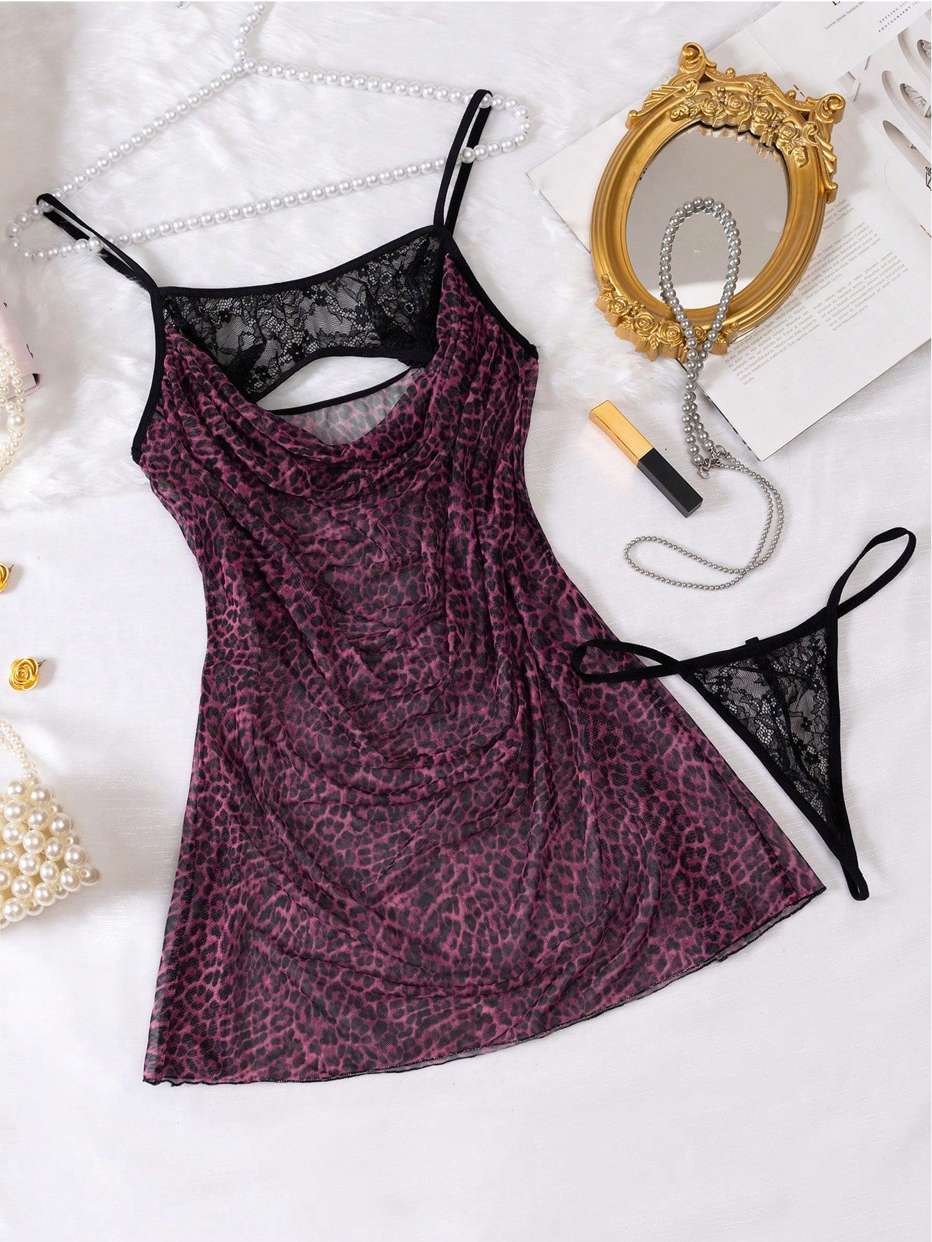 2-piece leopard print lingerie set featuring a hollow-out cami-style short nightgown with adjustable spaghetti straps and a matching low-rise V-string panty.