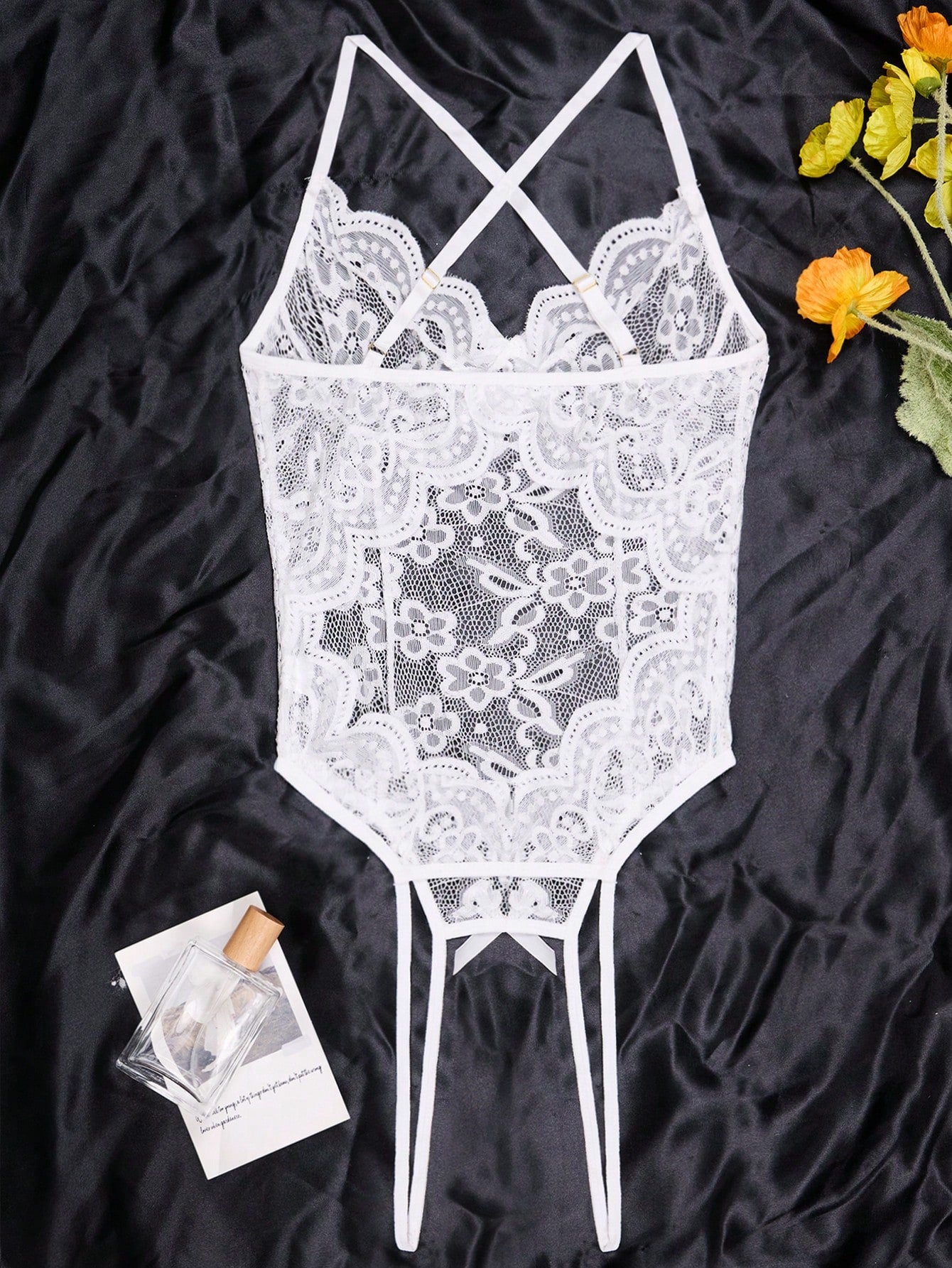 1-piece women’s tight-fitting sheer lace bodysuit lingerie with contrast lace, V-neck, adjustable straps, underwire half-cup bralette design, high-rise thong cut, and open crotch detail.