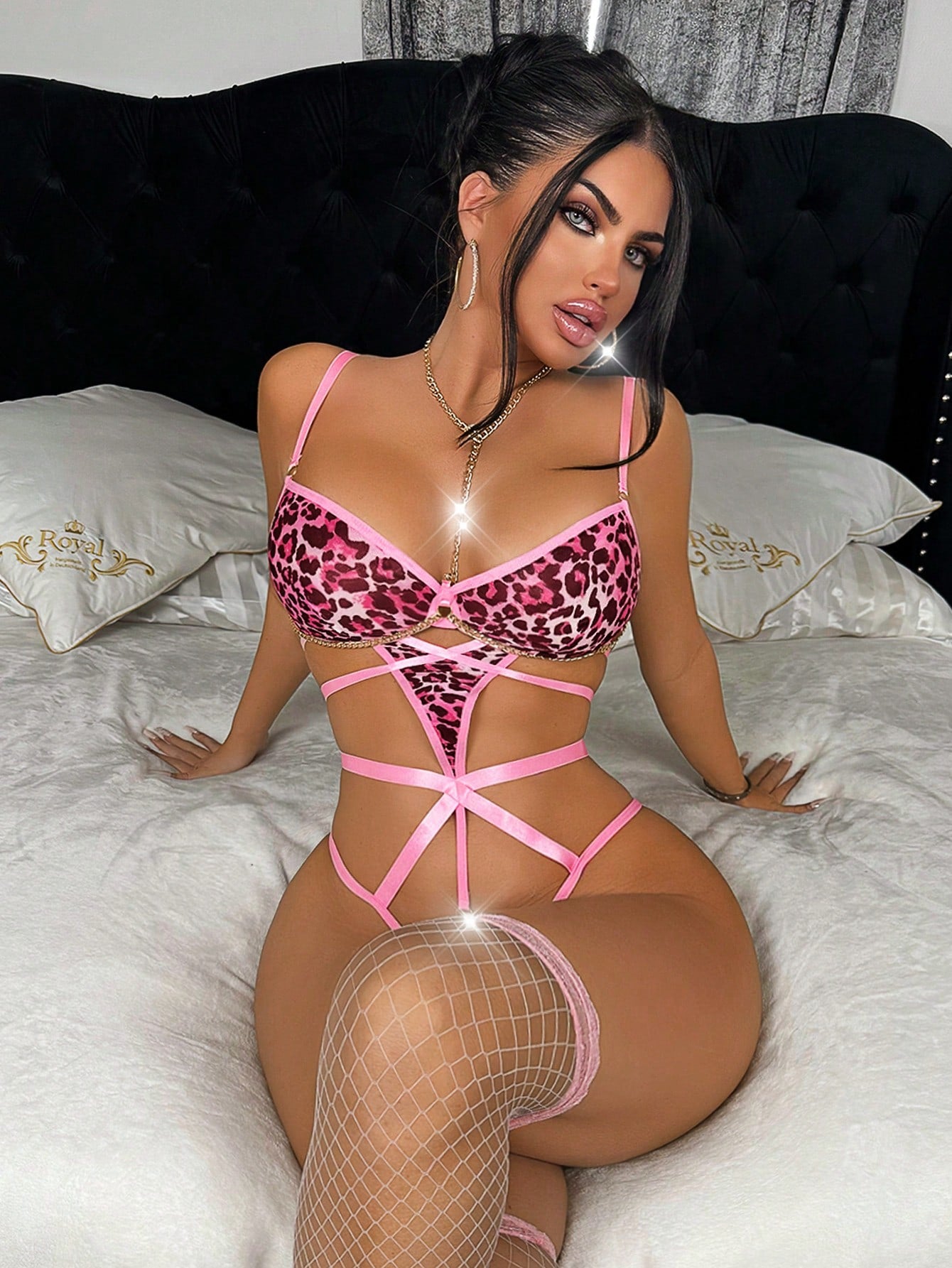 Pink women's sexy lingerie teddy bodysuit with collar, triangle cups, adjustable straps, multi-hook closure, and tie-front detail.