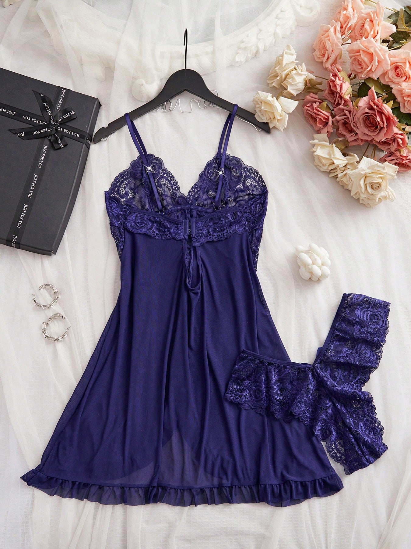 Women's 2-piece sexy lingerie set featuring a deep V sheer contrast lace babydoll bra with adjustable spaghetti straps and matching low-rise briefs; wireless plunge style with short sleeveless romantic design.