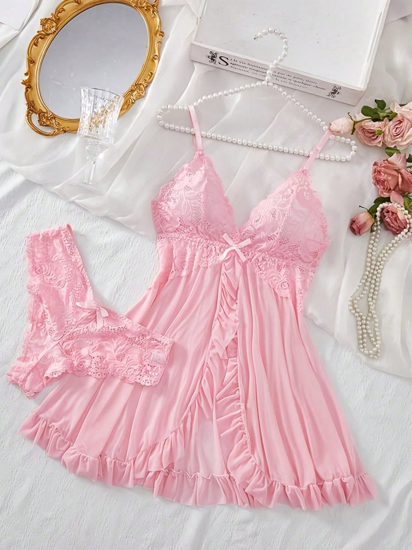 Women's 2-piece sexy lingerie set featuring a deep V sheer contrast lace babydoll bra with adjustable spaghetti straps and matching low-rise briefs; wireless plunge style with short sleeveless romantic design.