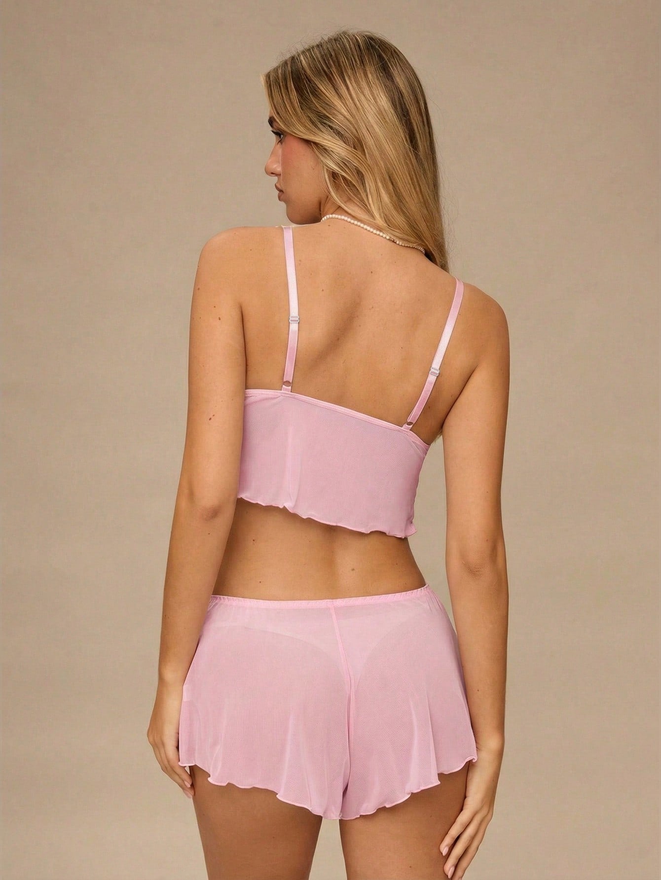 2-piece women’s lingerie set with floral embroidery detail and sheer mesh, featuring a camisole bra with adjustable straps and matching mid-rise boyshorts.