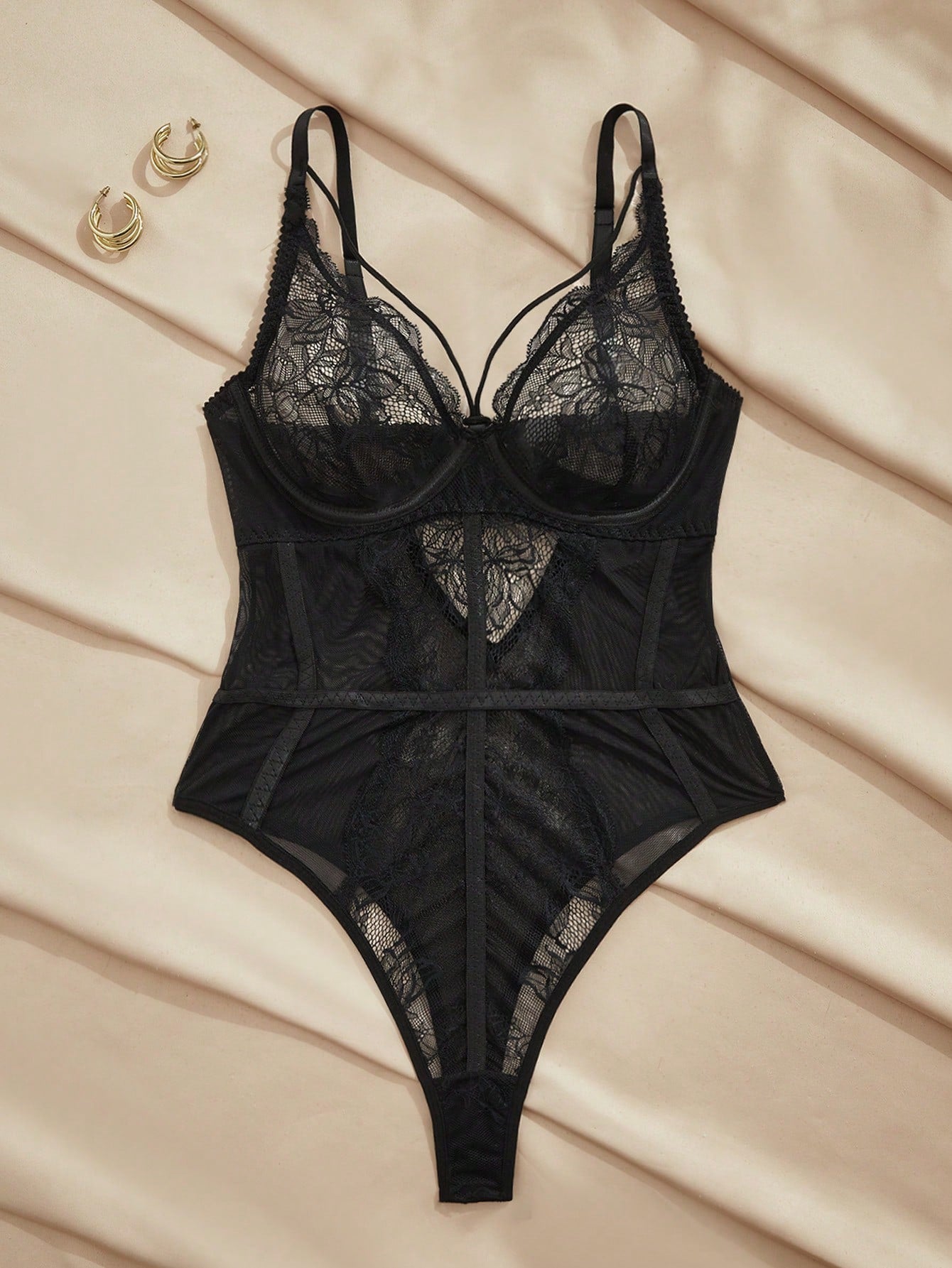 Women's underwire teddy bodysuit with contrast lace and mesh patchwork, adjustable spaghetti straps, sheer details, and 3/4 cup design.