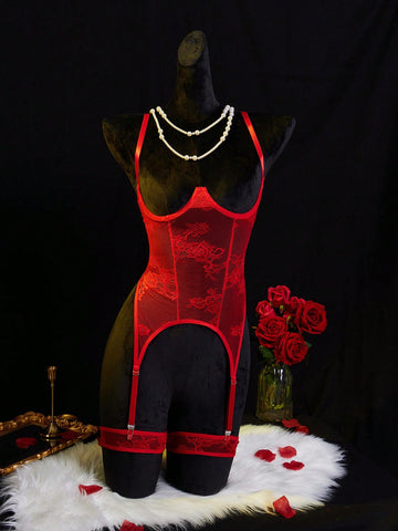 Women’s red semi-sheer lingerie set with contrast lace patchwork and hollow-out details, featuring adjustable spaghetti straps, an underwire longline bra style top, and a low-rise V-string bottom.