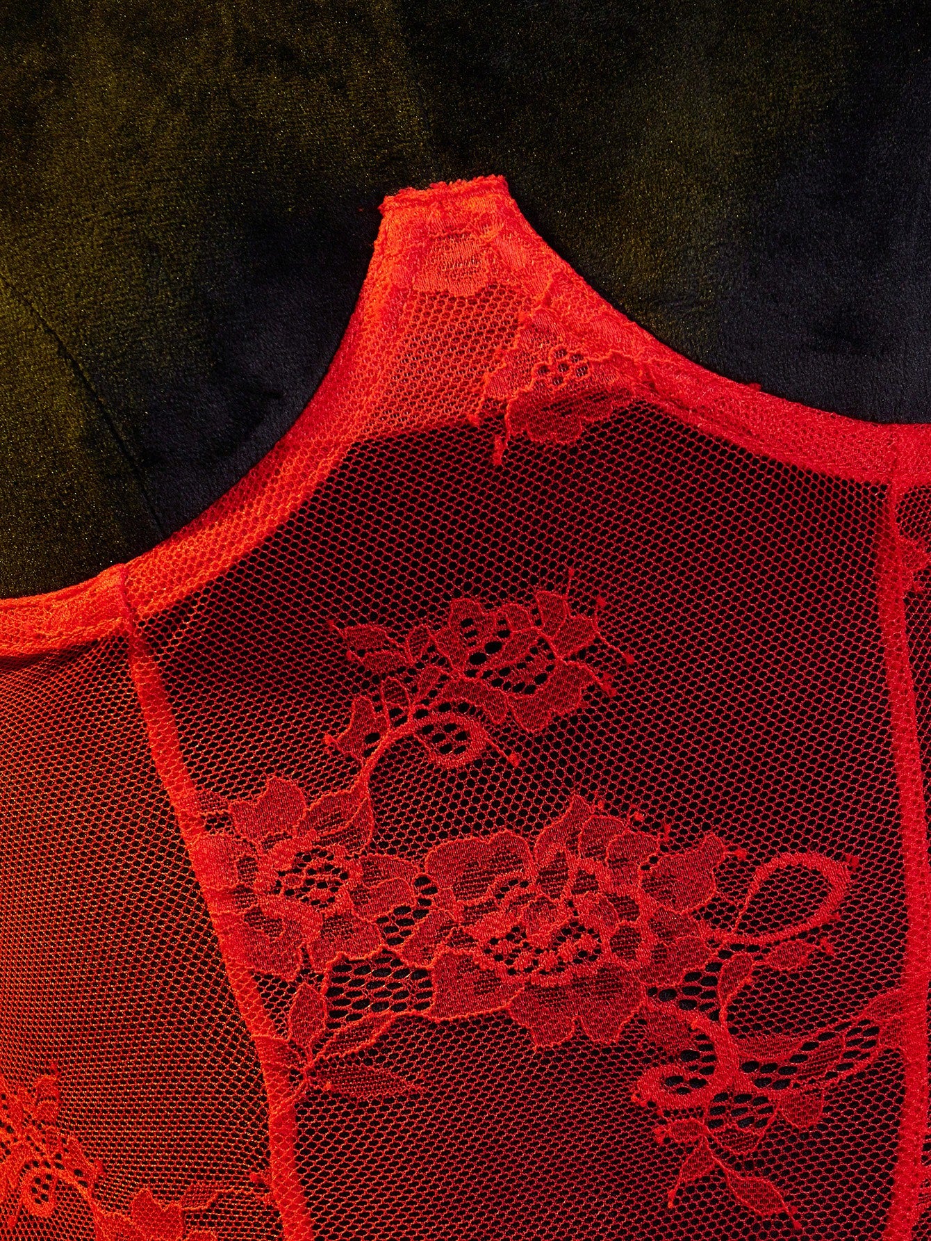 Women’s red semi-sheer lingerie set with contrast lace patchwork and hollow-out details, featuring adjustable spaghetti straps, an underwire longline bra style top, and a low-rise V-string bottom.