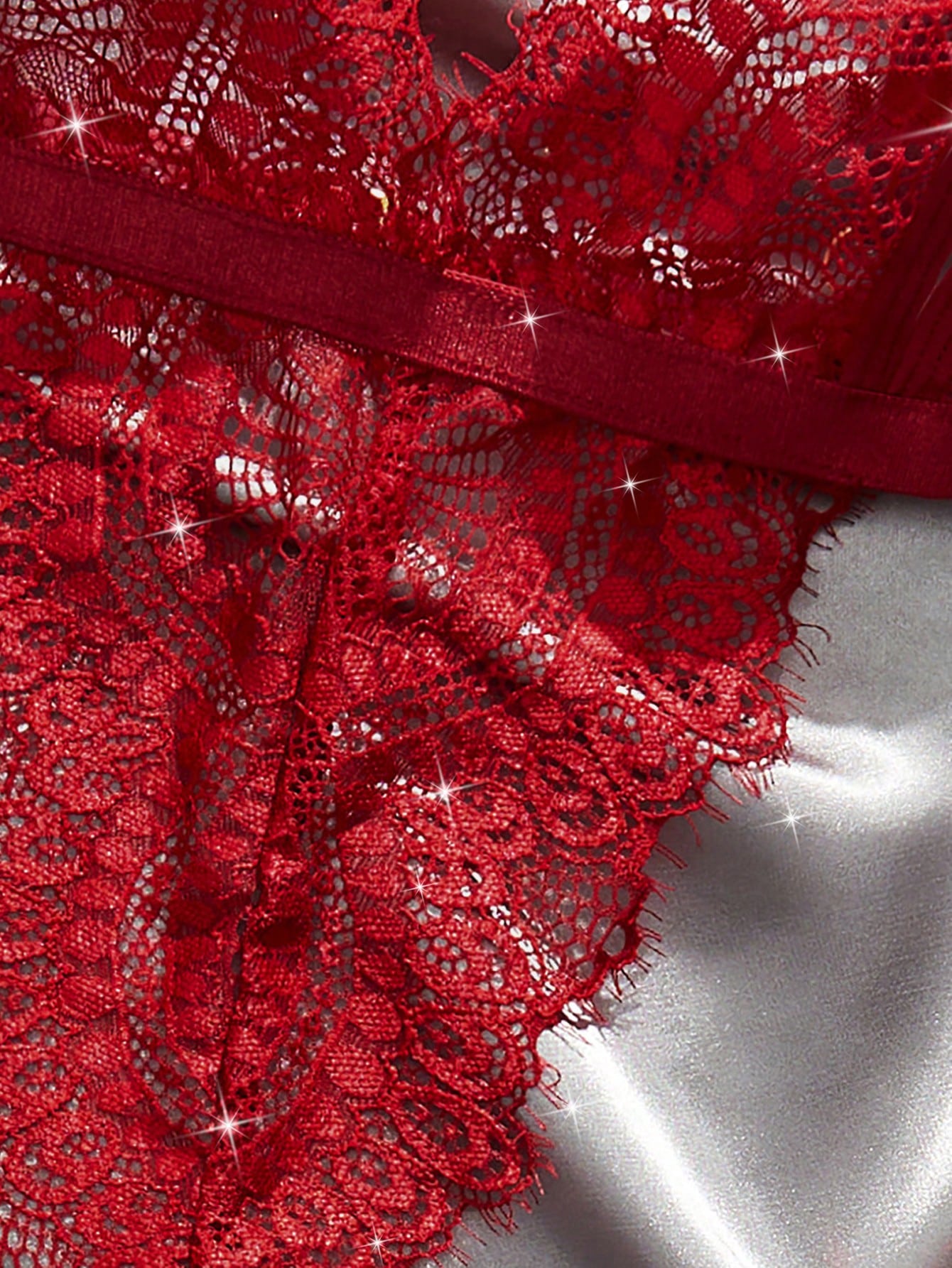 Plain cut-out teddy bodysuit lingerie with bow detail, spaghetti straps, triangle cups, and V-string design.
