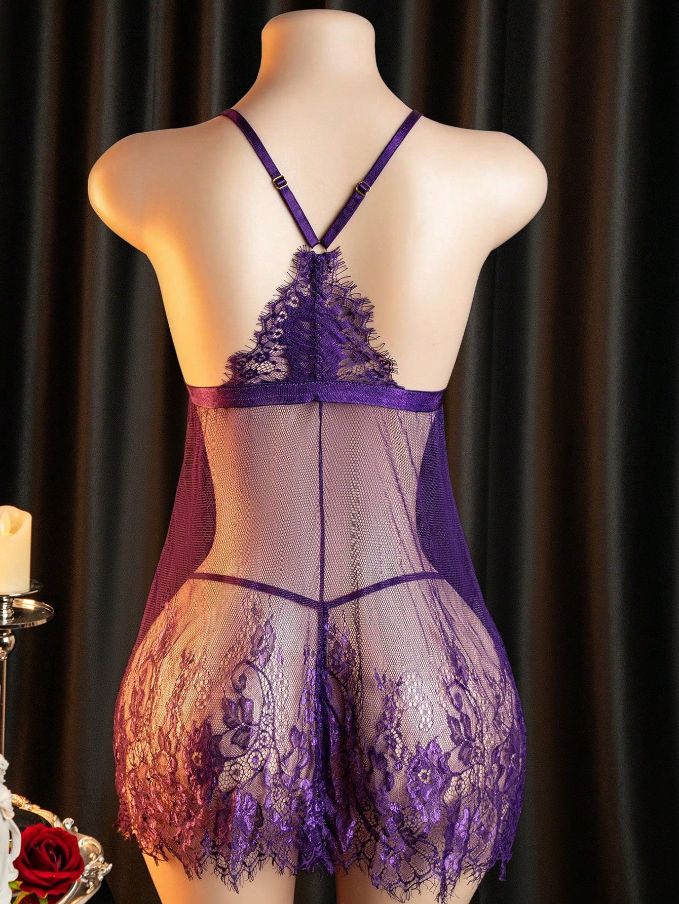Purple women’s 2-piece lingerie set featuring a spaghetti strap slip dress with crossback detail, hollow-out design, short slit mini length, and matching V-string panty.